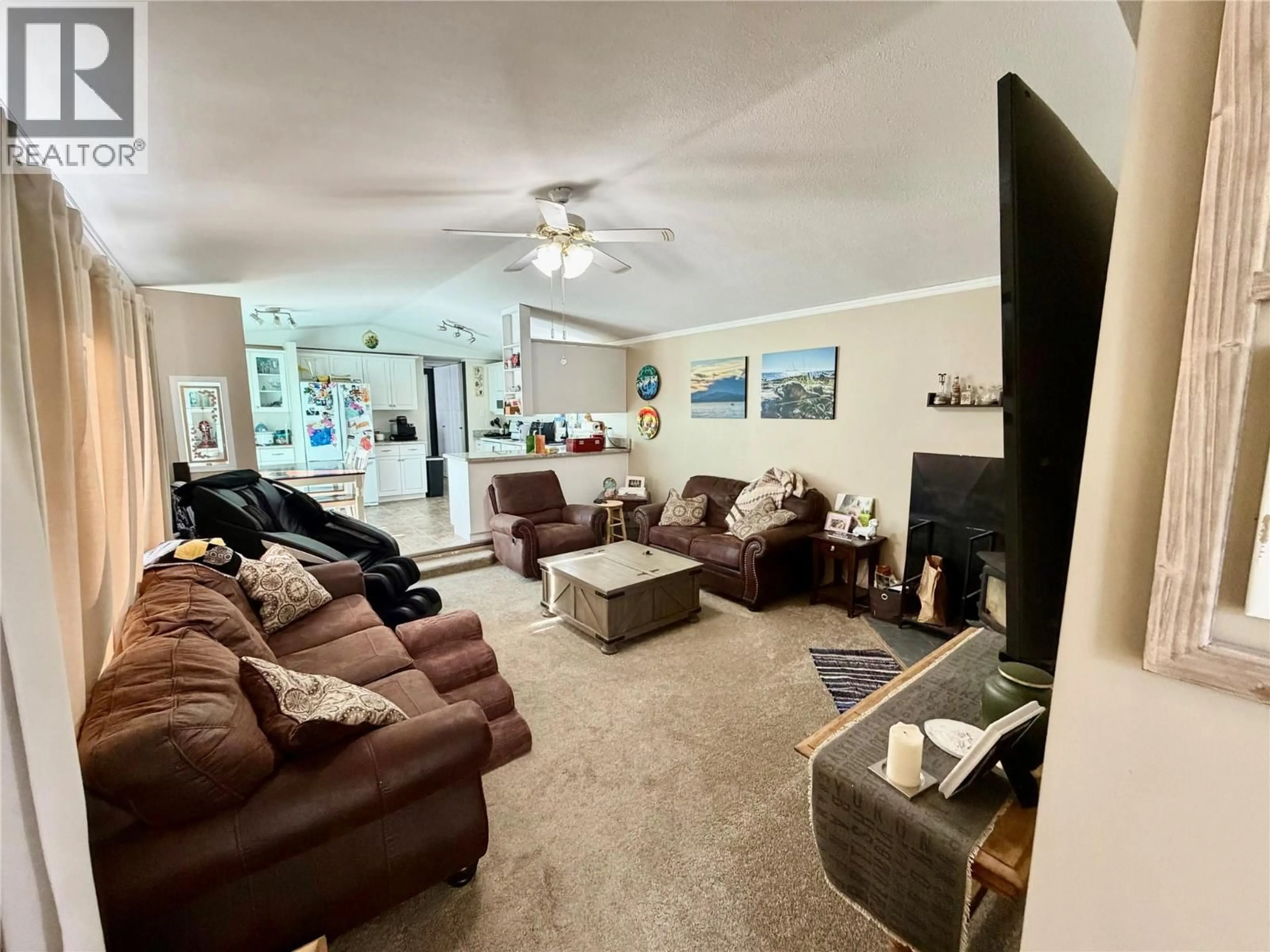 Living room with furniture, unknown for 13239 MCKINNON WAY, Dawson Creek British Columbia V1G0C2