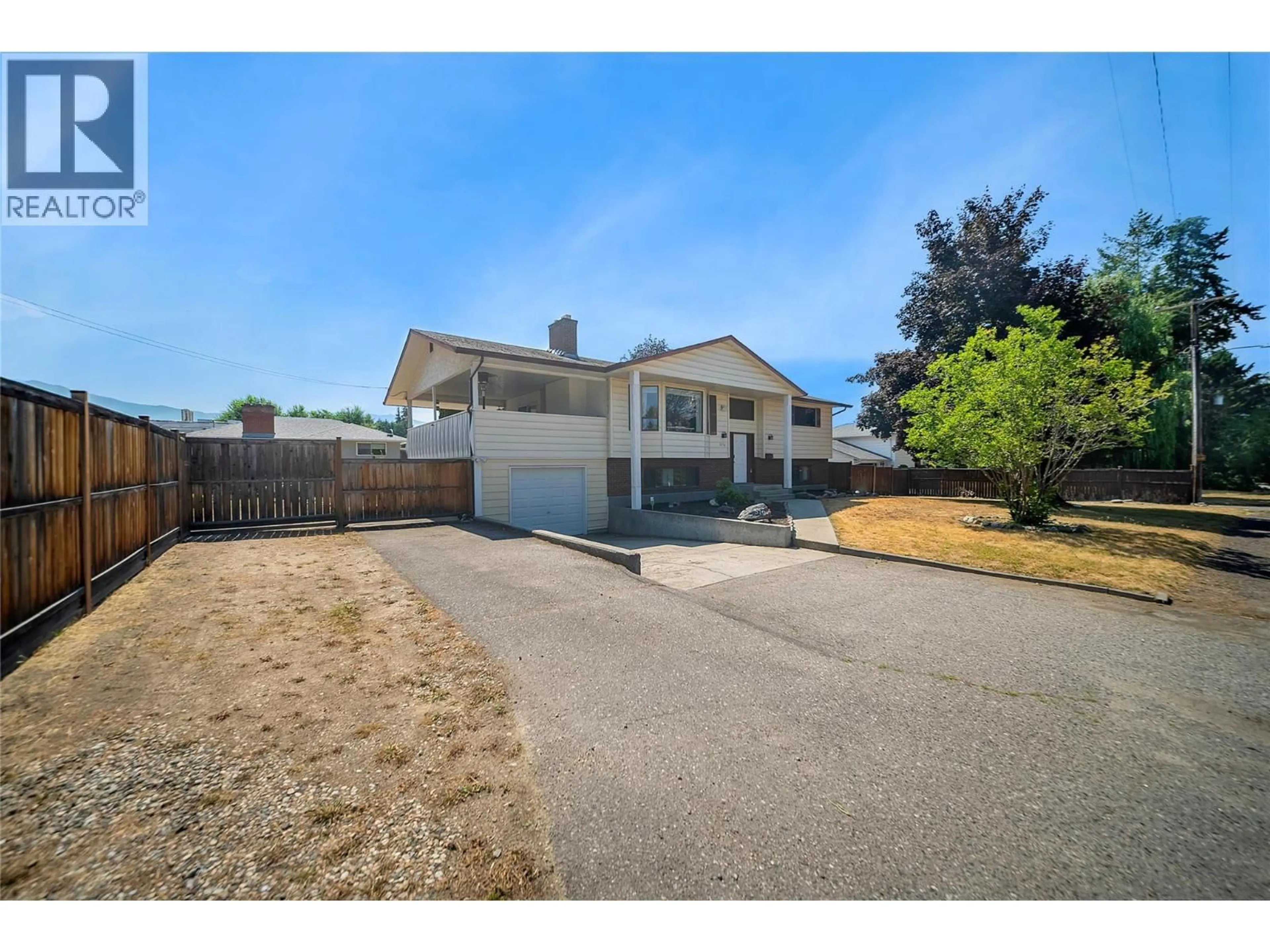 A pic from outside/outdoor area/front of a property/back of a property/a pic from drone, street for 579 CORYELL ROAD, Kelowna British Columbia V1W1B3