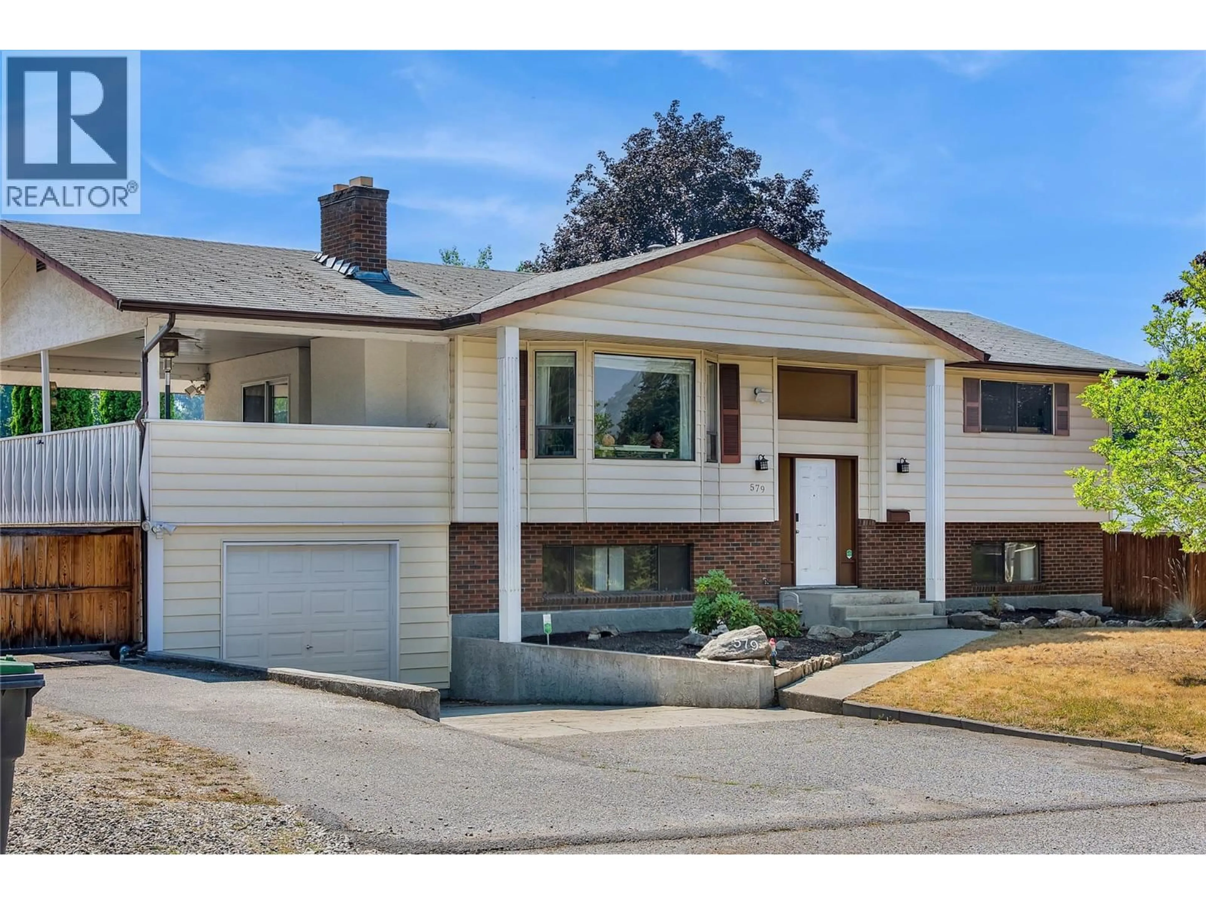 Home with brick exterior material, street for 579 CORYELL ROAD, Kelowna British Columbia V1W1B3