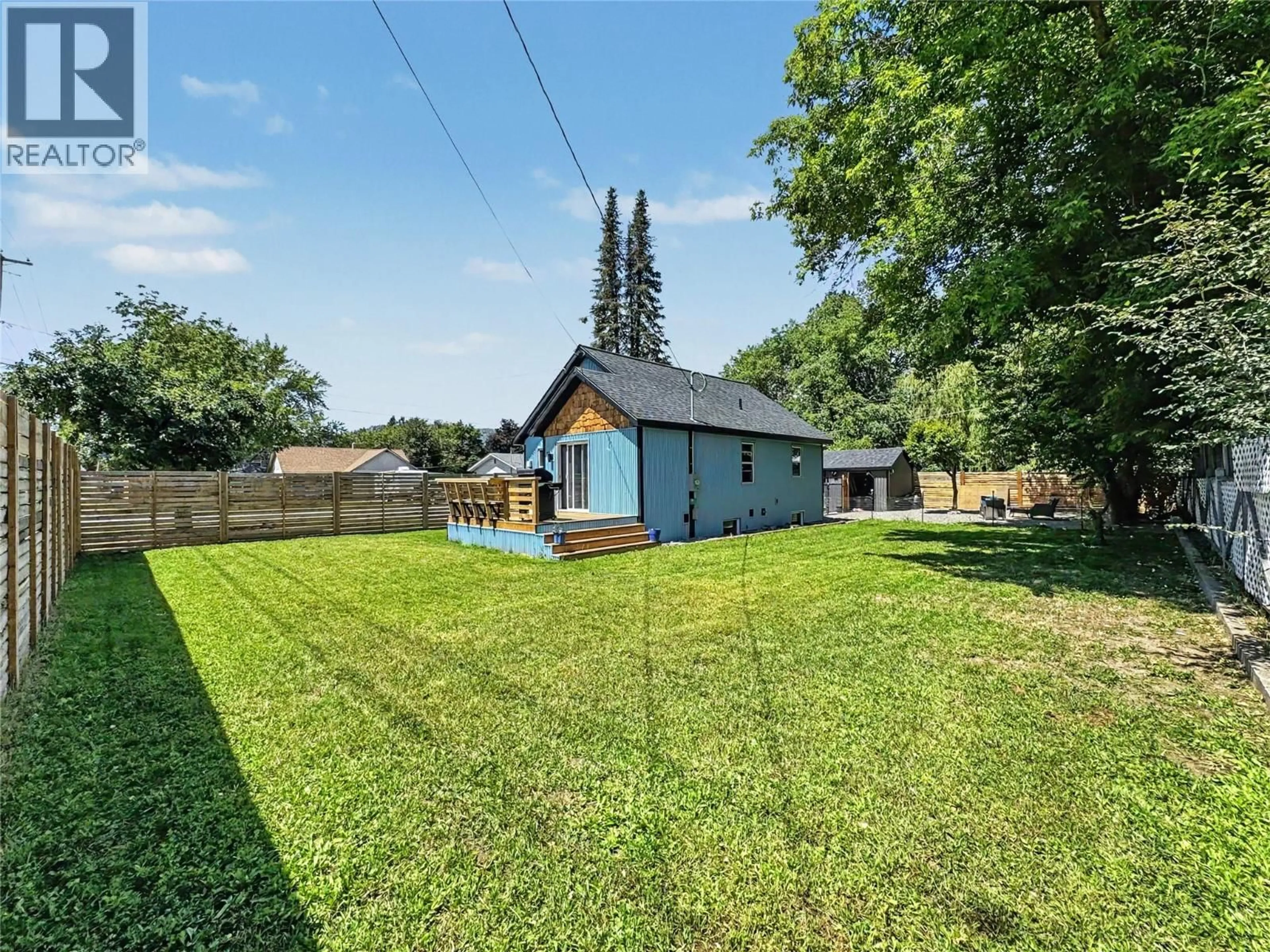 A pic from outside/outdoor area/front of a property/back of a property/a pic from drone, unknown for 987 KETTLE RIVER DRIVE, Grand Forks British Columbia V0H1H0
