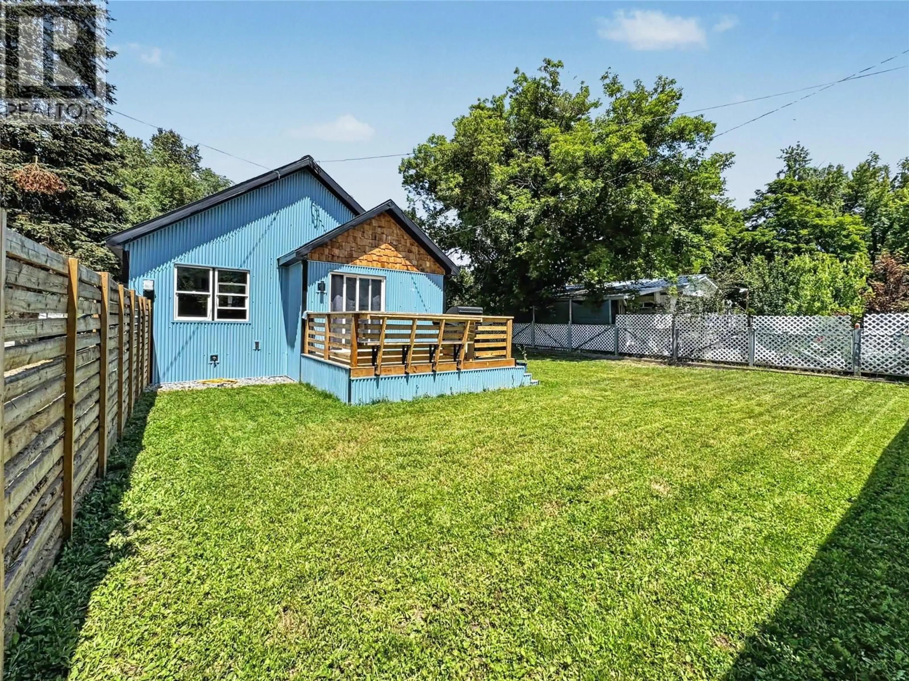 A pic from outside/outdoor area/front of a property/back of a property/a pic from drone, unknown for 987 KETTLE RIVER DRIVE, Grand Forks British Columbia V0H1H0