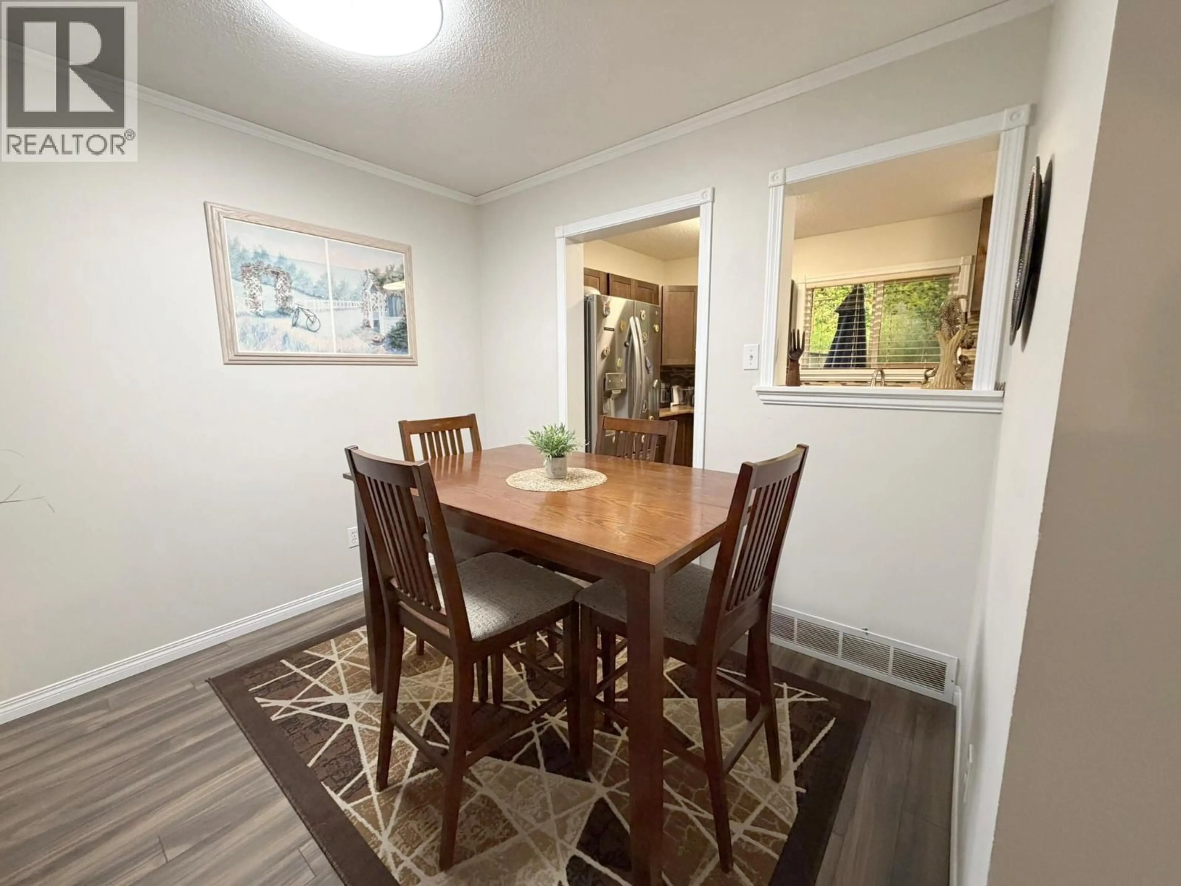 Dining room, wood/laminate floor for 58 - 1469 SPRINGHILL DRIVE, Kamloops British Columbia V2E1H5