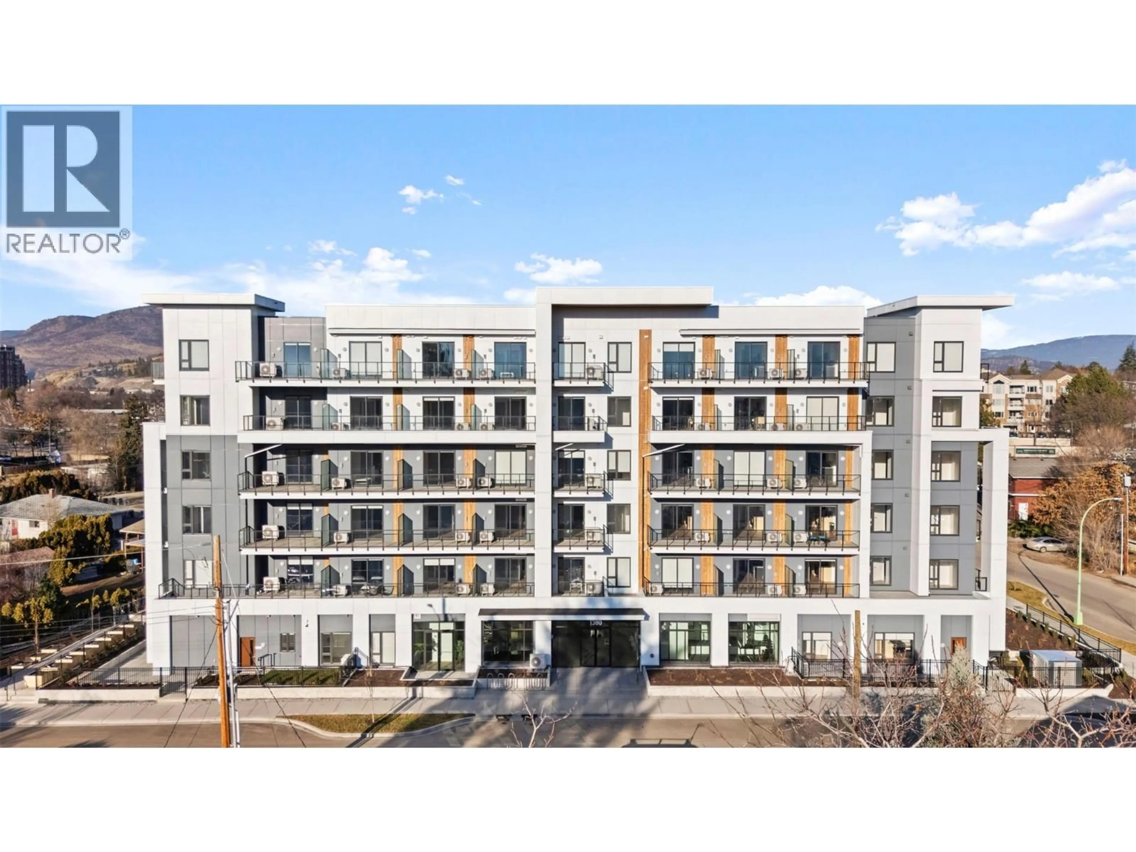 A pic from outside/outdoor area/front of a property/back of a property/a pic from drone, building for 212 - 1380 PRIDHAM AVENUE, Kelowna British Columbia V1Y6B9
