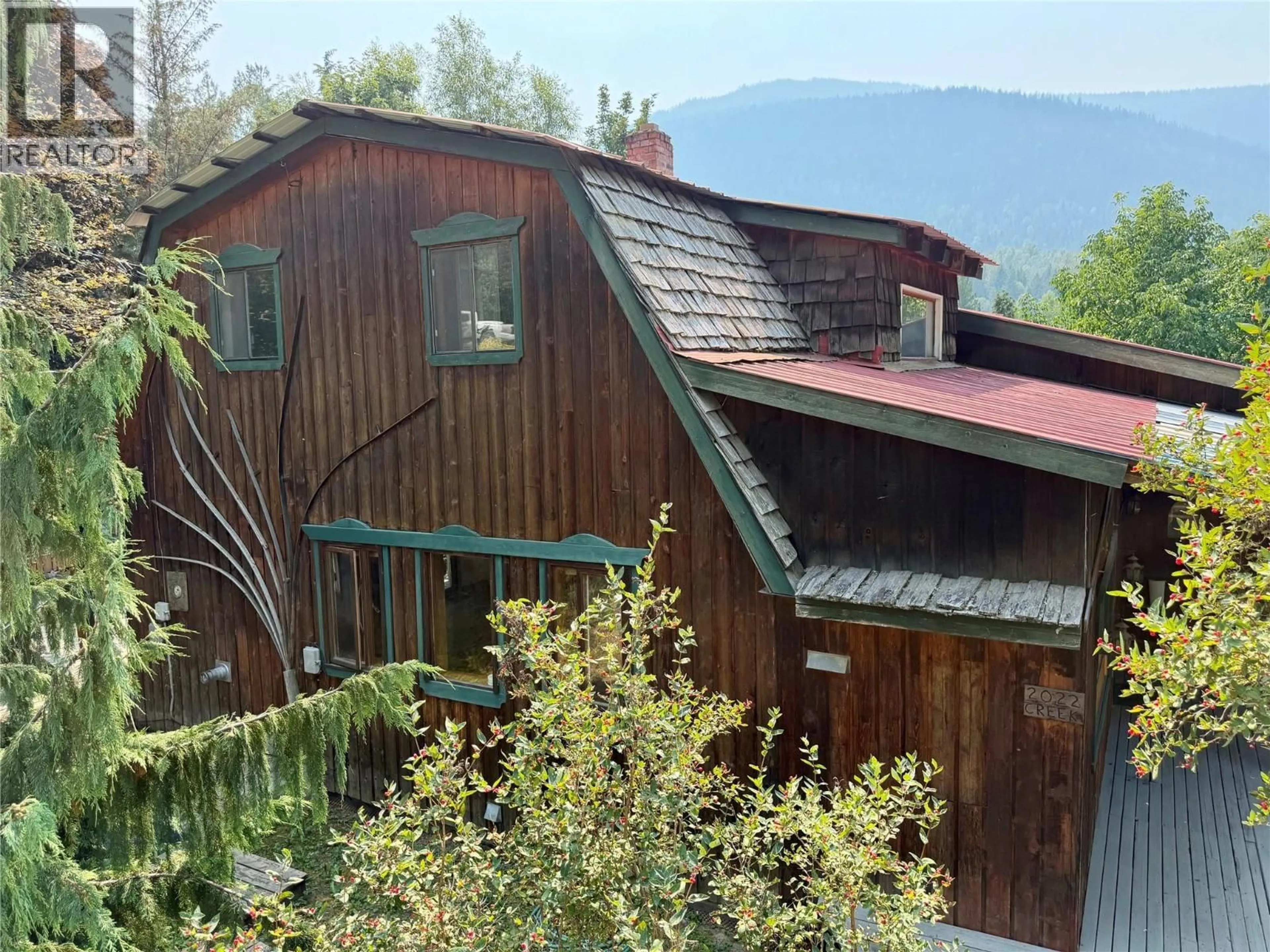 A pic from outside/outdoor area/front of a property/back of a property/a pic from drone, mountain view for 2022 CREEK STREET, Nelson British Columbia V1L1M7