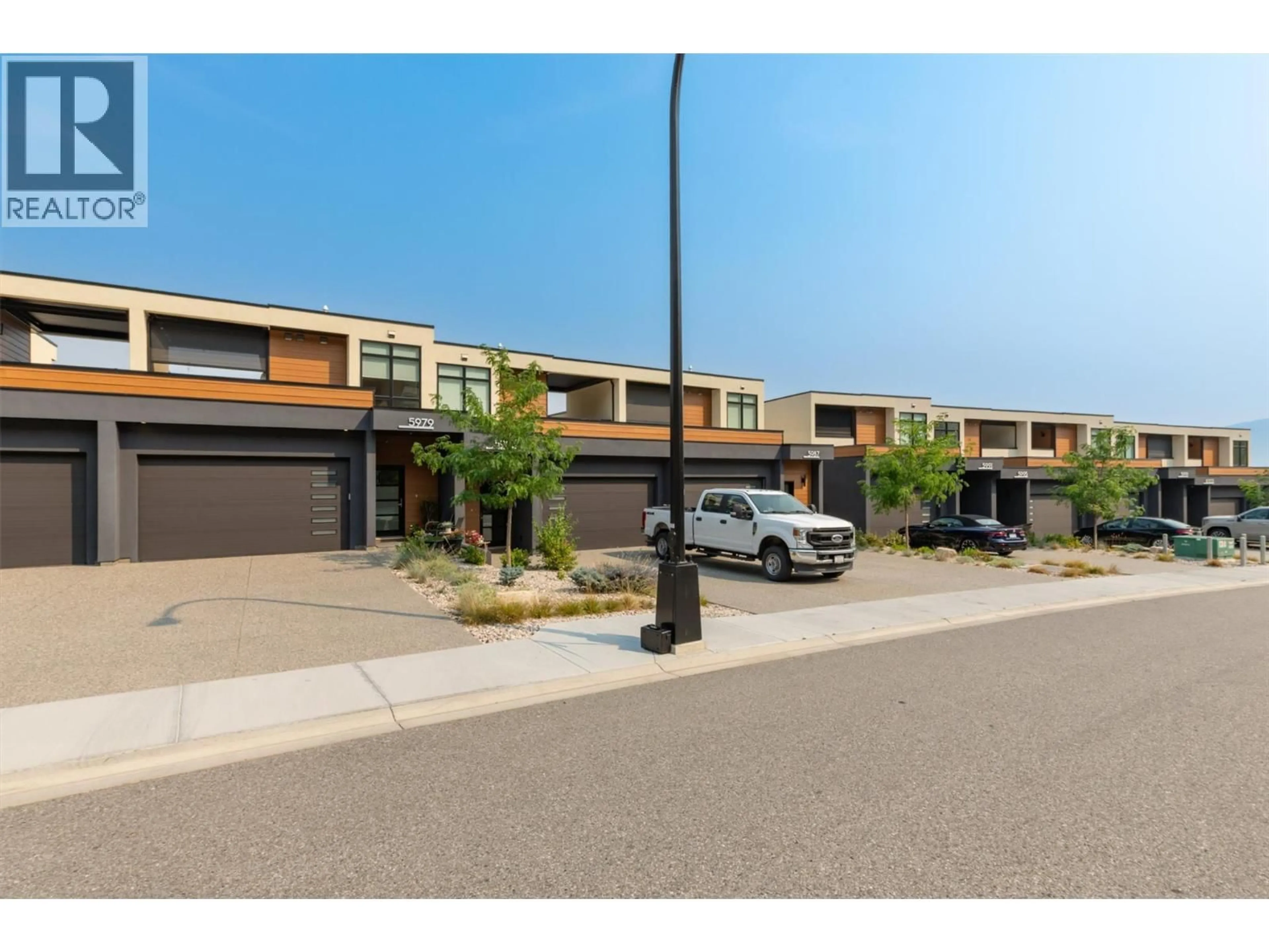 A pic from outside/outdoor area/front of a property/back of a property/a pic from drone, street for 5979 PRINCESS STREET, Peachland British Columbia V0H1X7