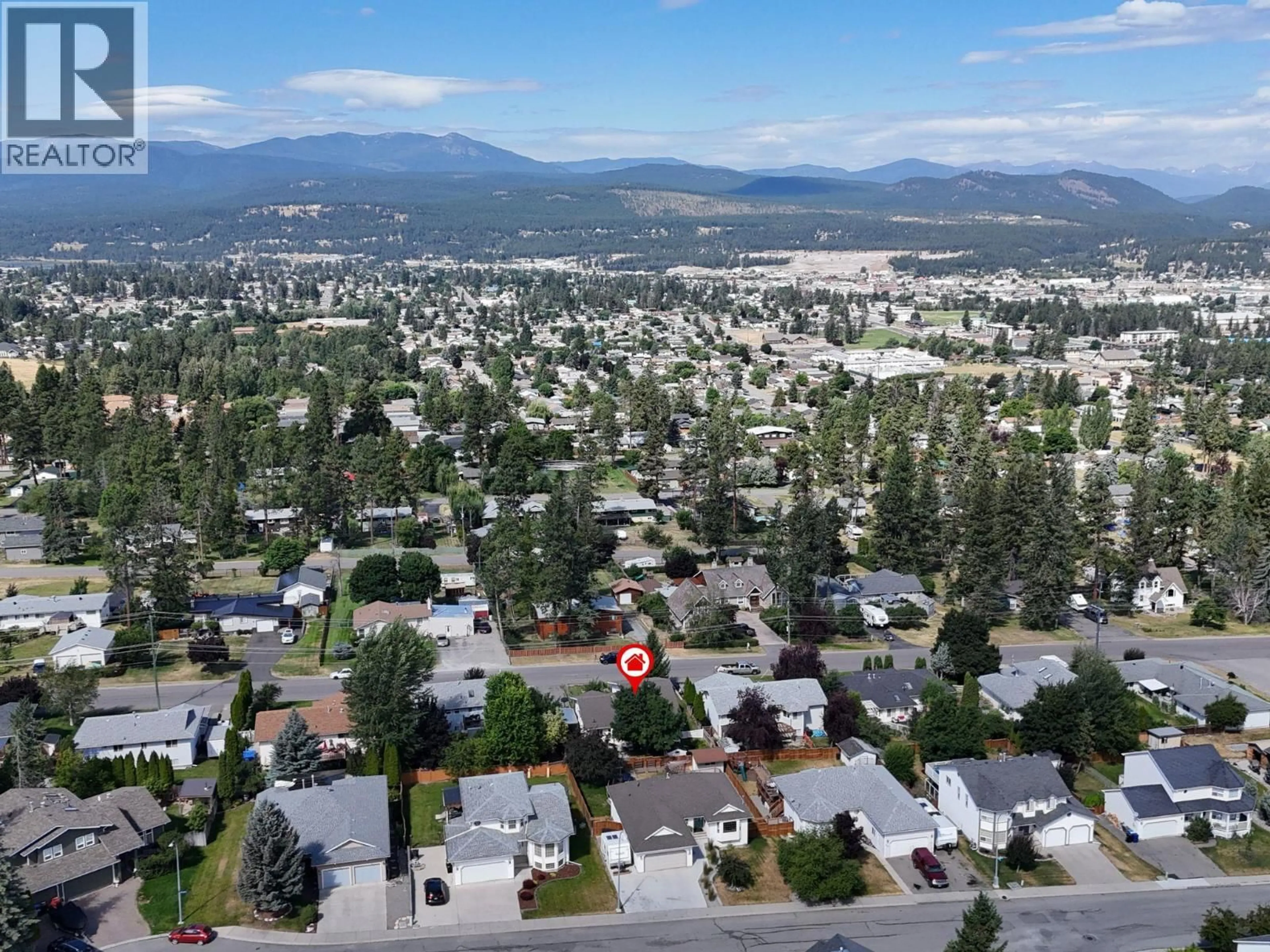 A pic from outside/outdoor area/front of a property/back of a property/a pic from drone, mountain view for 504 30TH AVENUE SOUTH, Cranbrook British Columbia V1C6H1