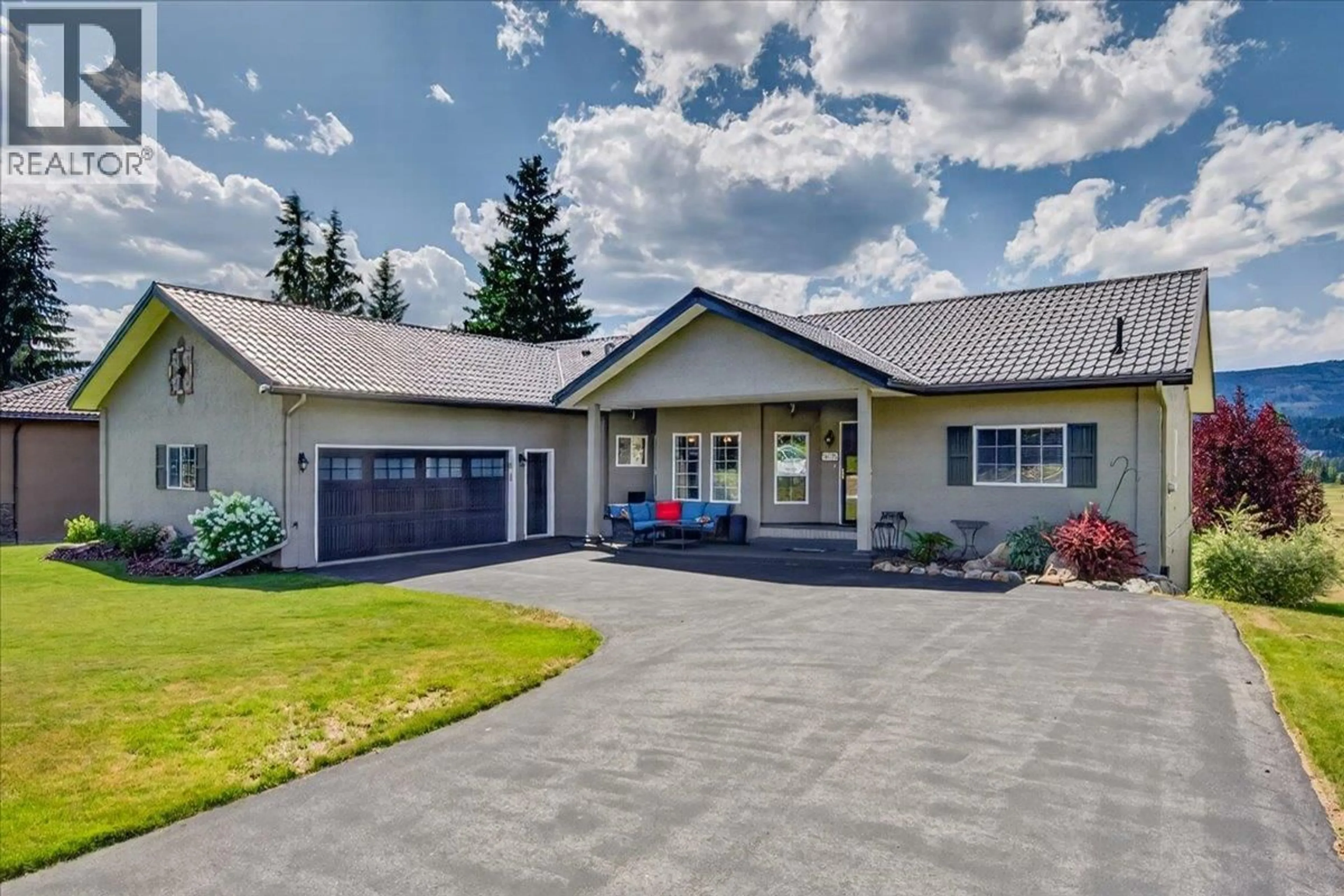 Home with vinyl exterior material, street for 5075 RIVERVIEW ROAD, Fairmont Hot Springs British Columbia V0B1L1