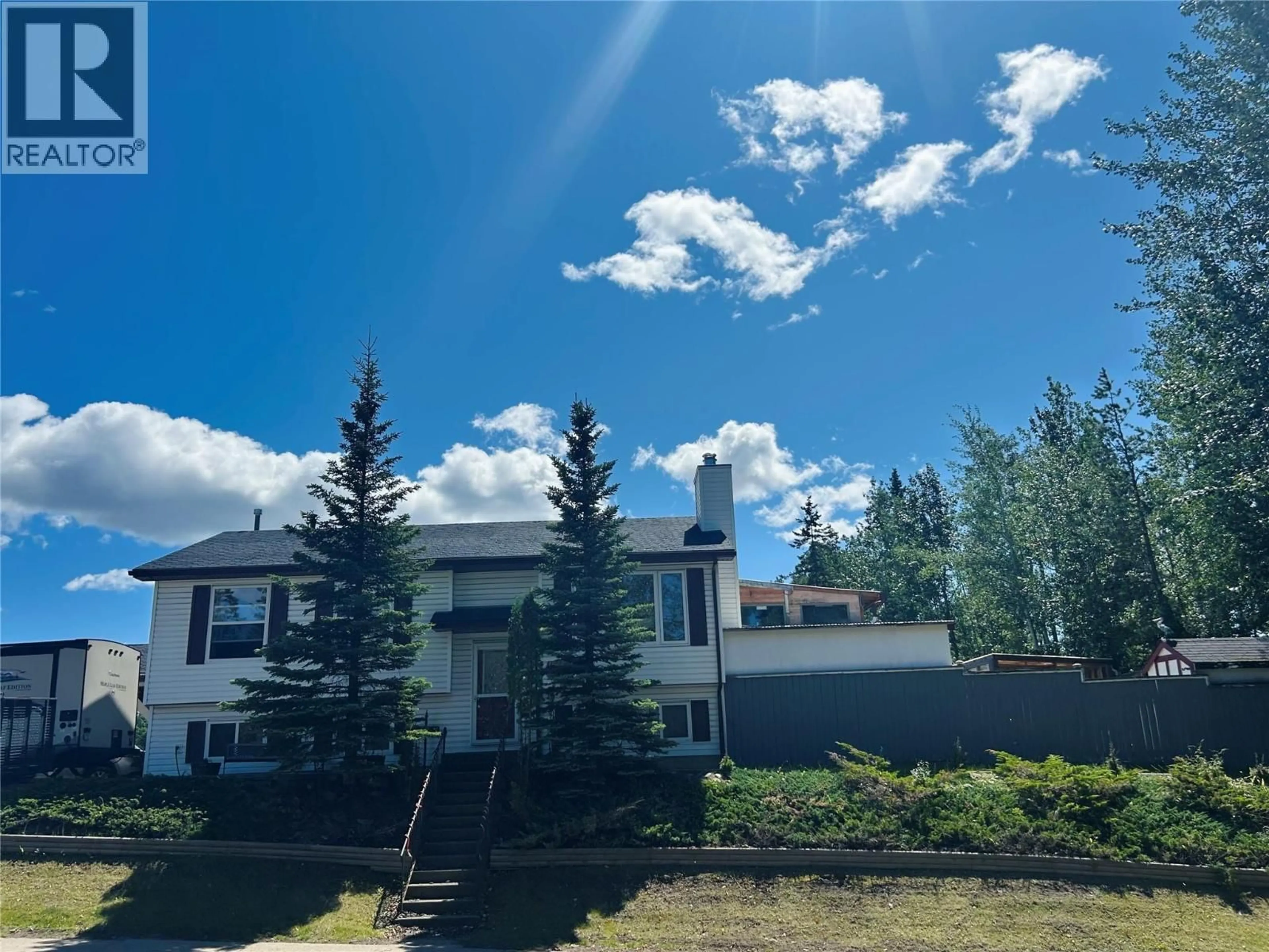 A pic from outside/outdoor area/front of a property/back of a property/a pic from drone, mountain view for 101 MURRAY DRIVE, Tumbler Ridge British Columbia V0C2W0