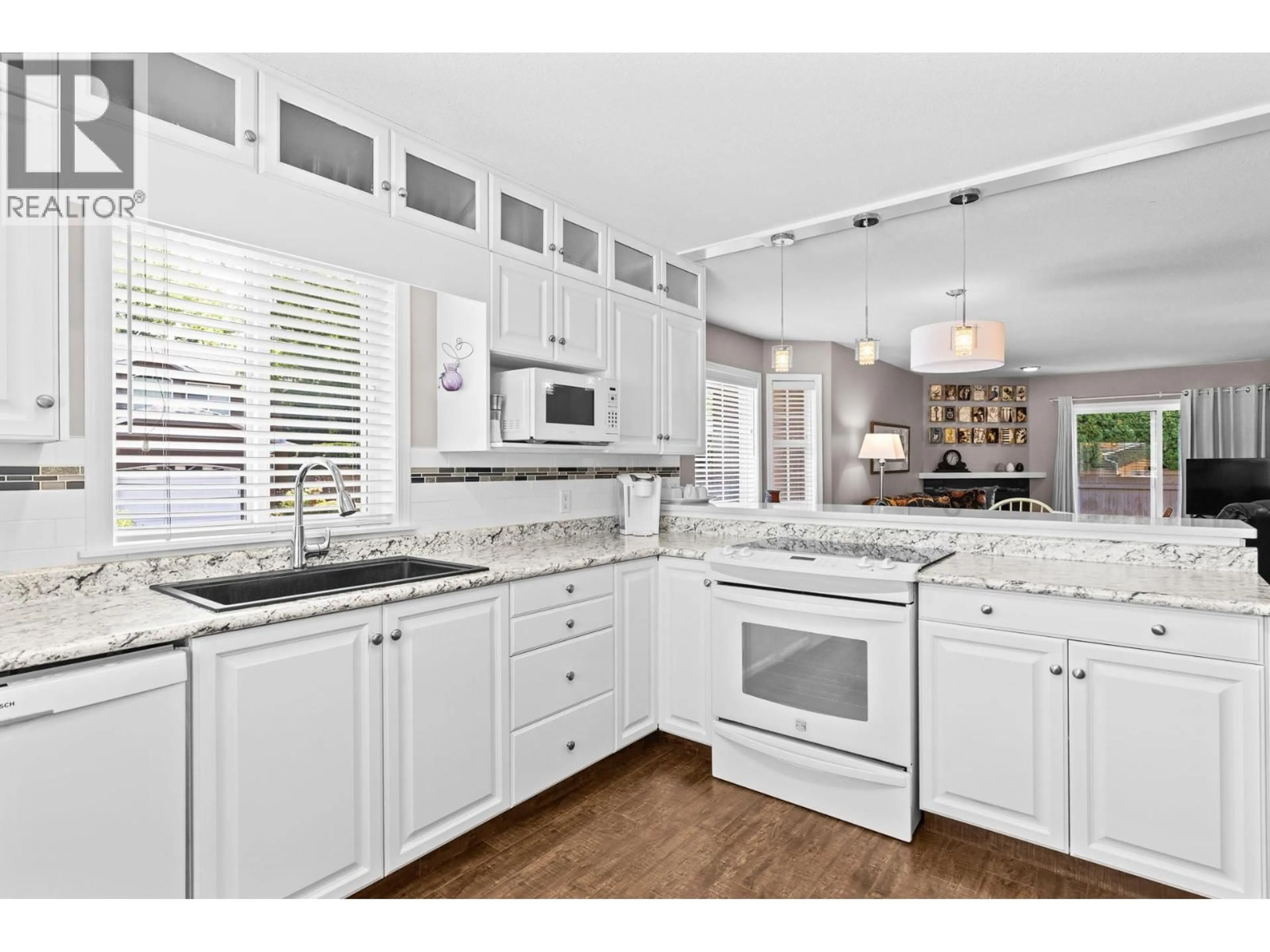 Open concept kitchen, ceramic/tile floor for 11 - 535 GLENMEADOWS ROAD, Kelowna British Columbia V1V1X7