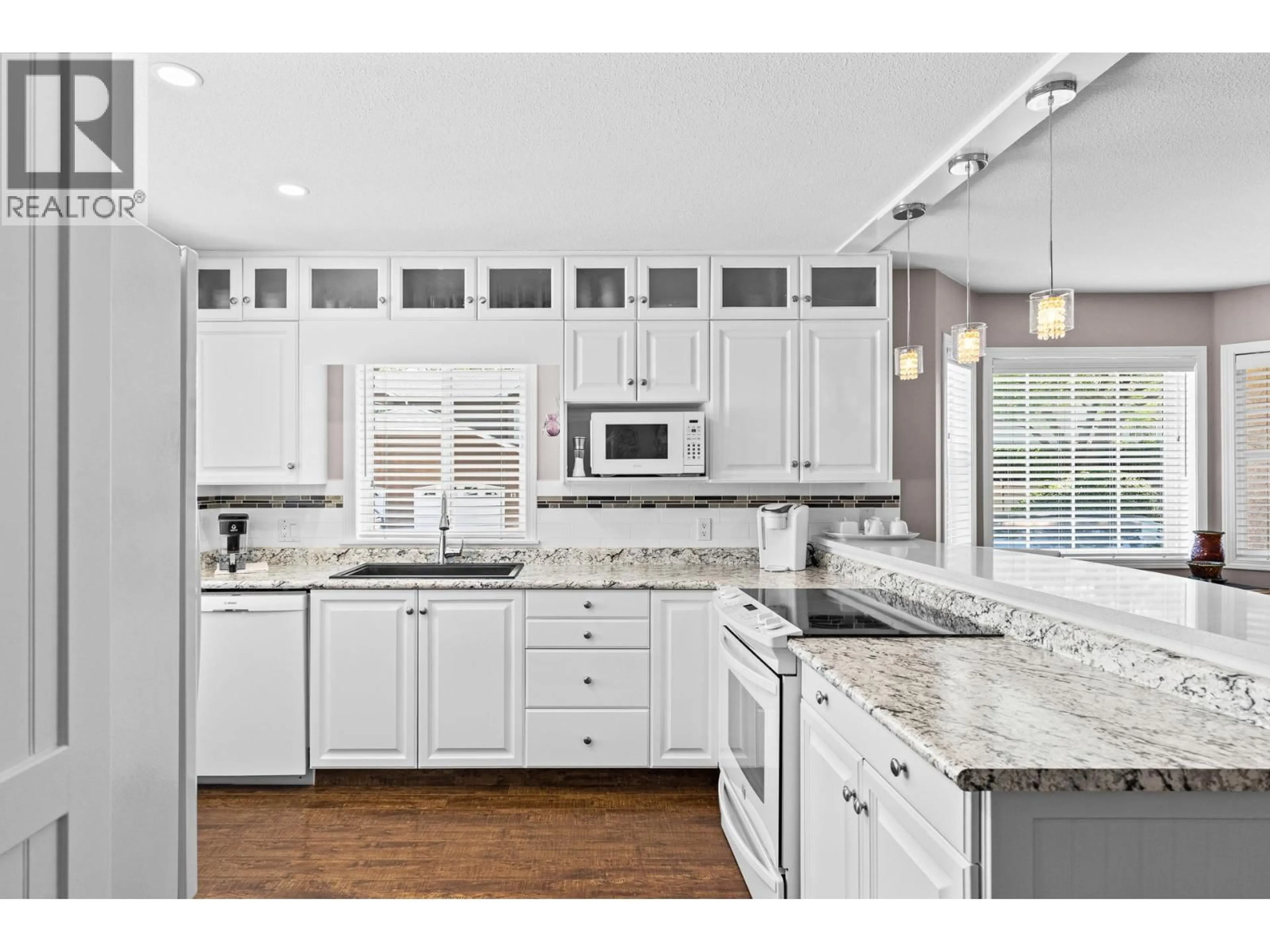 Open concept kitchen, ceramic/tile floor for 11 - 535 GLENMEADOWS ROAD, Kelowna British Columbia V1V1X7