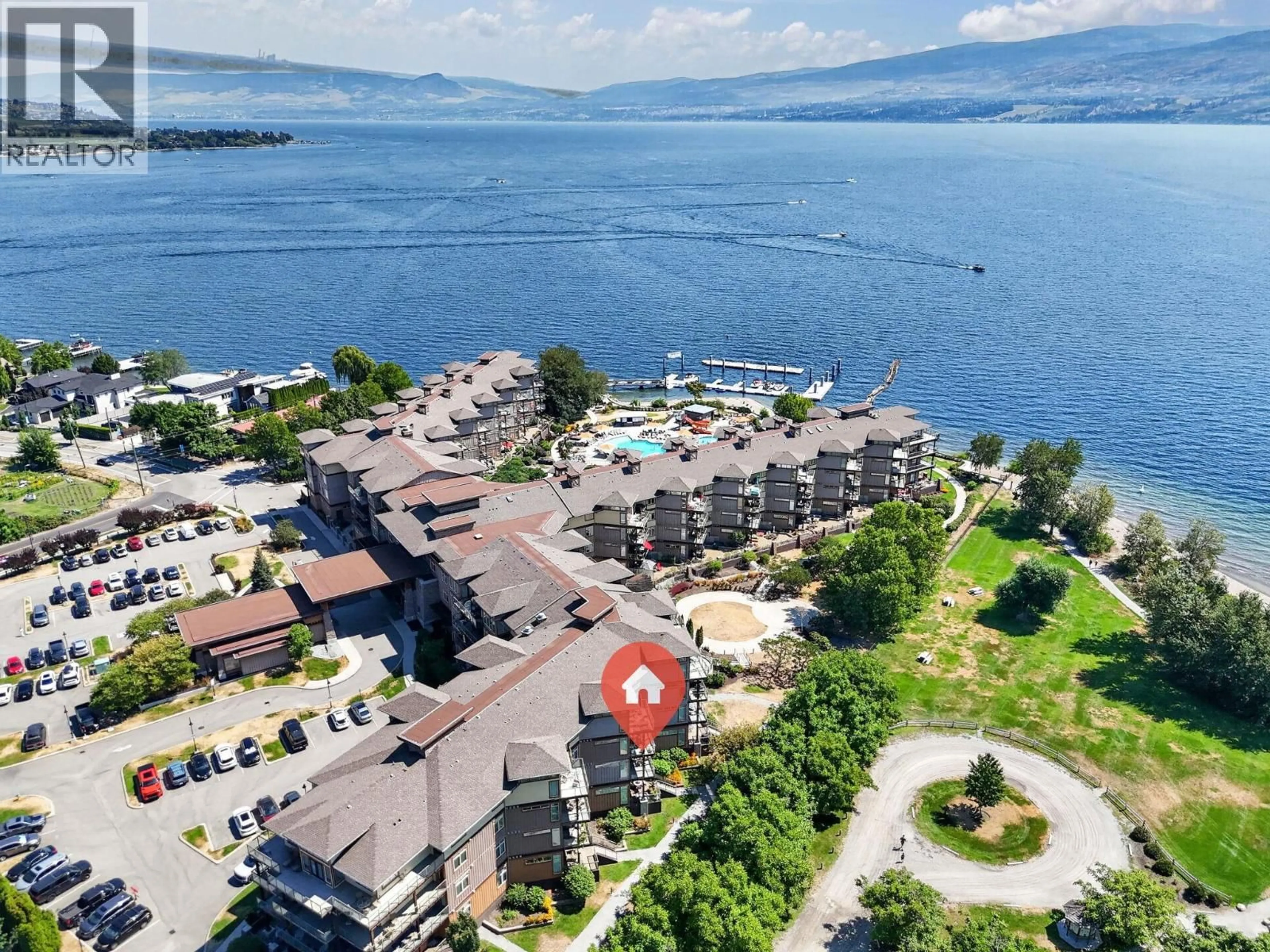 A pic from outside/outdoor area/front of a property/back of a property/a pic from drone, water/lake/river/ocean view for 336 - 4205 GELLATLY ROAD, West Kelowna British Columbia V4T2K5