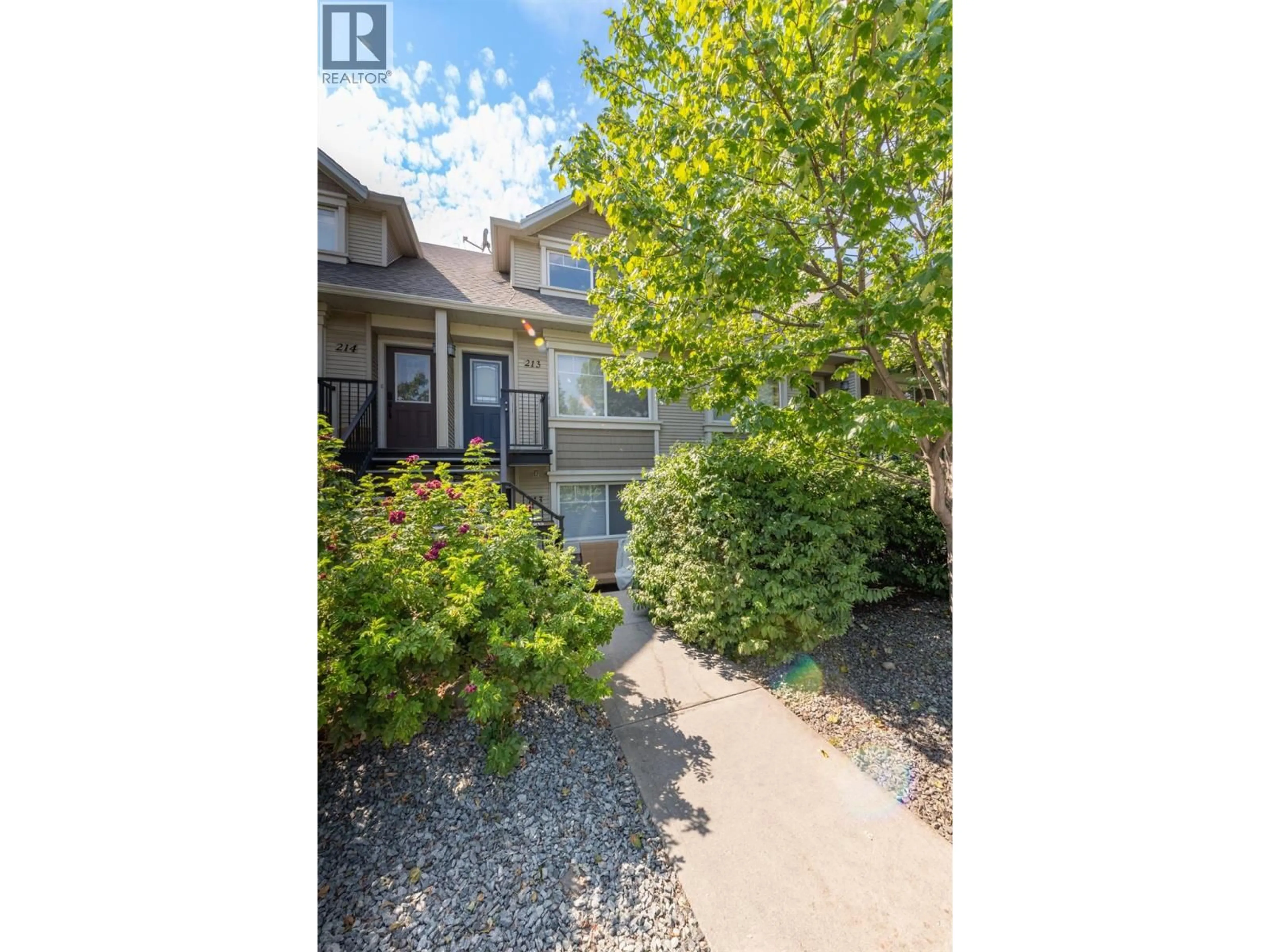A pic from outside/outdoor area/front of a property/back of a property/a pic from drone, street for 113 - 1390 DILWORTH CRESCENT, Kelowna British Columbia V1Y4M5