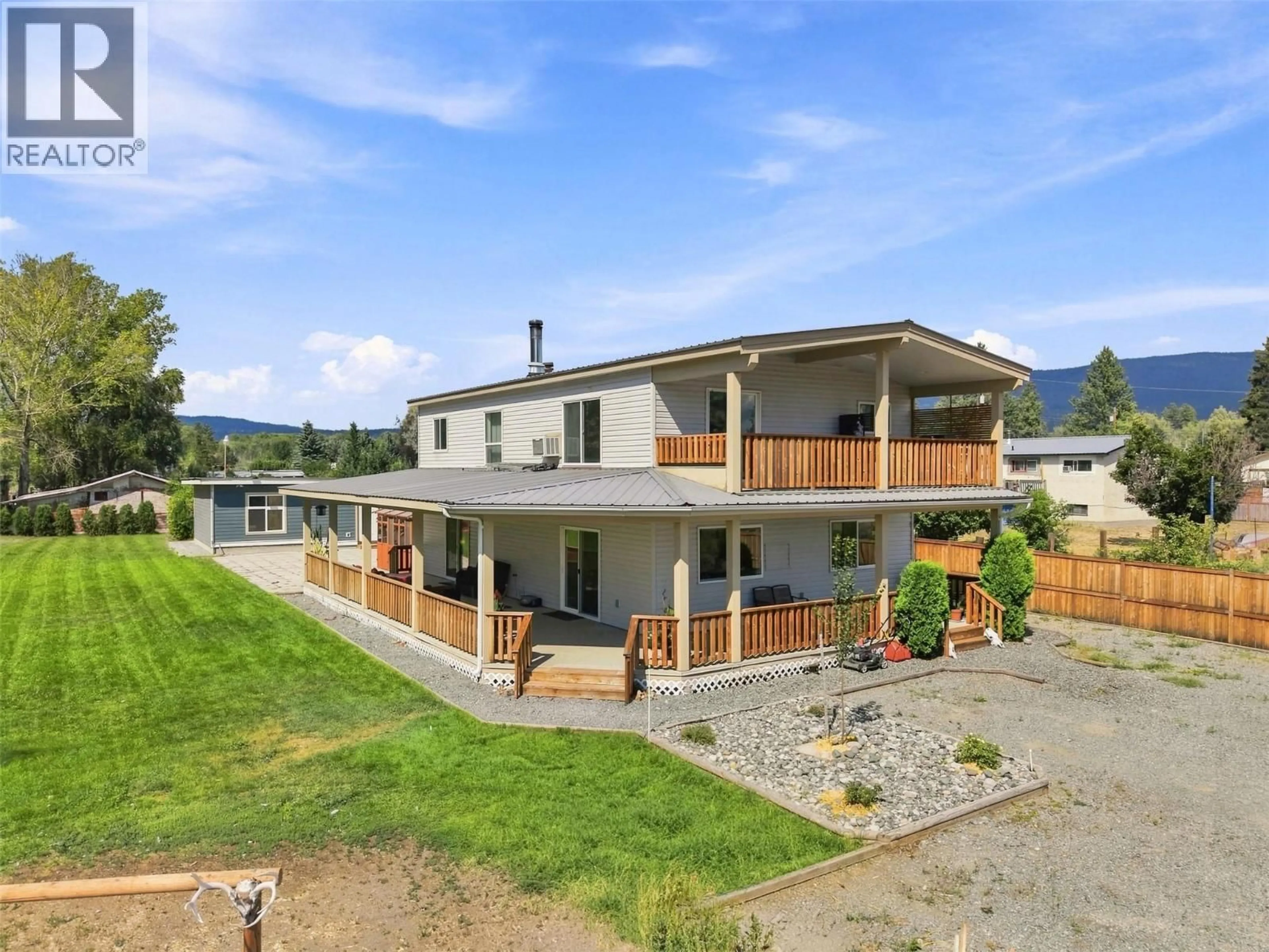 A pic from outside/outdoor area/front of a property/back of a property/a pic from drone, mountain view for 471 WOODWARD AVENUE, Merritt British Columbia V0K1Y0