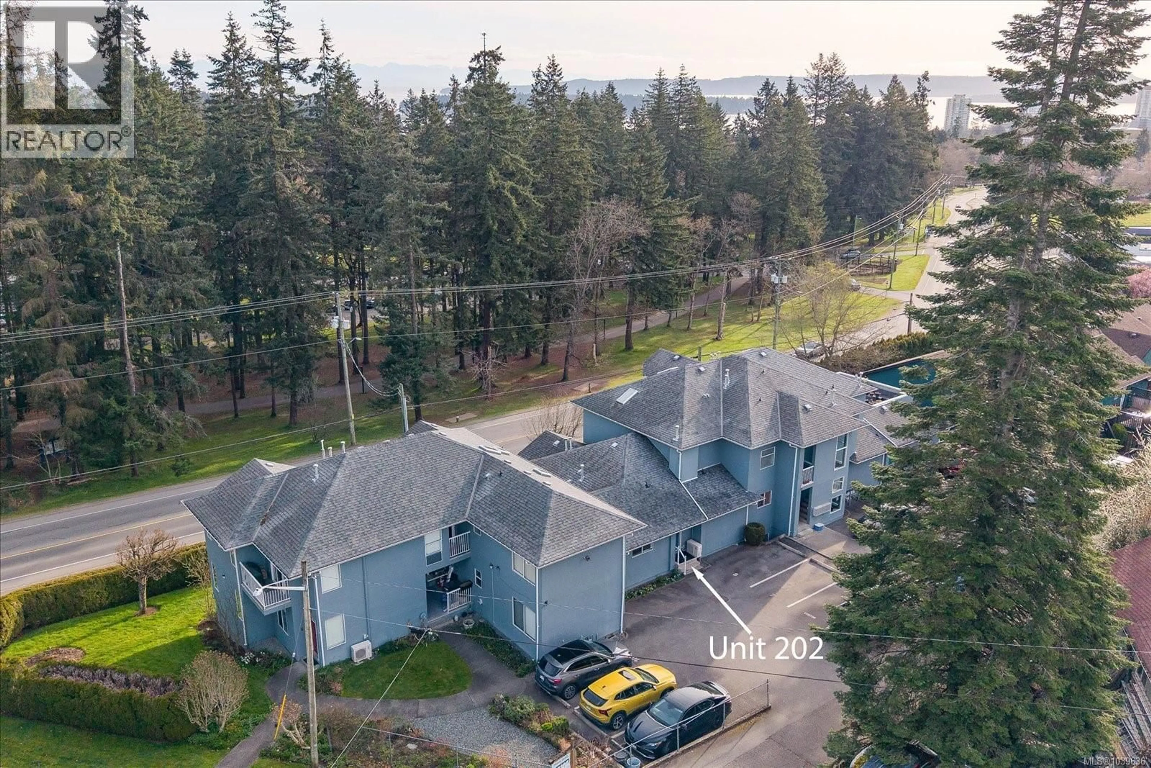 A pic from outside/outdoor area/front of a property/back of a property/a pic from drone, unknown for 202 - 2 DORIC AVENUE, Nanaimo British Columbia V9R3N1