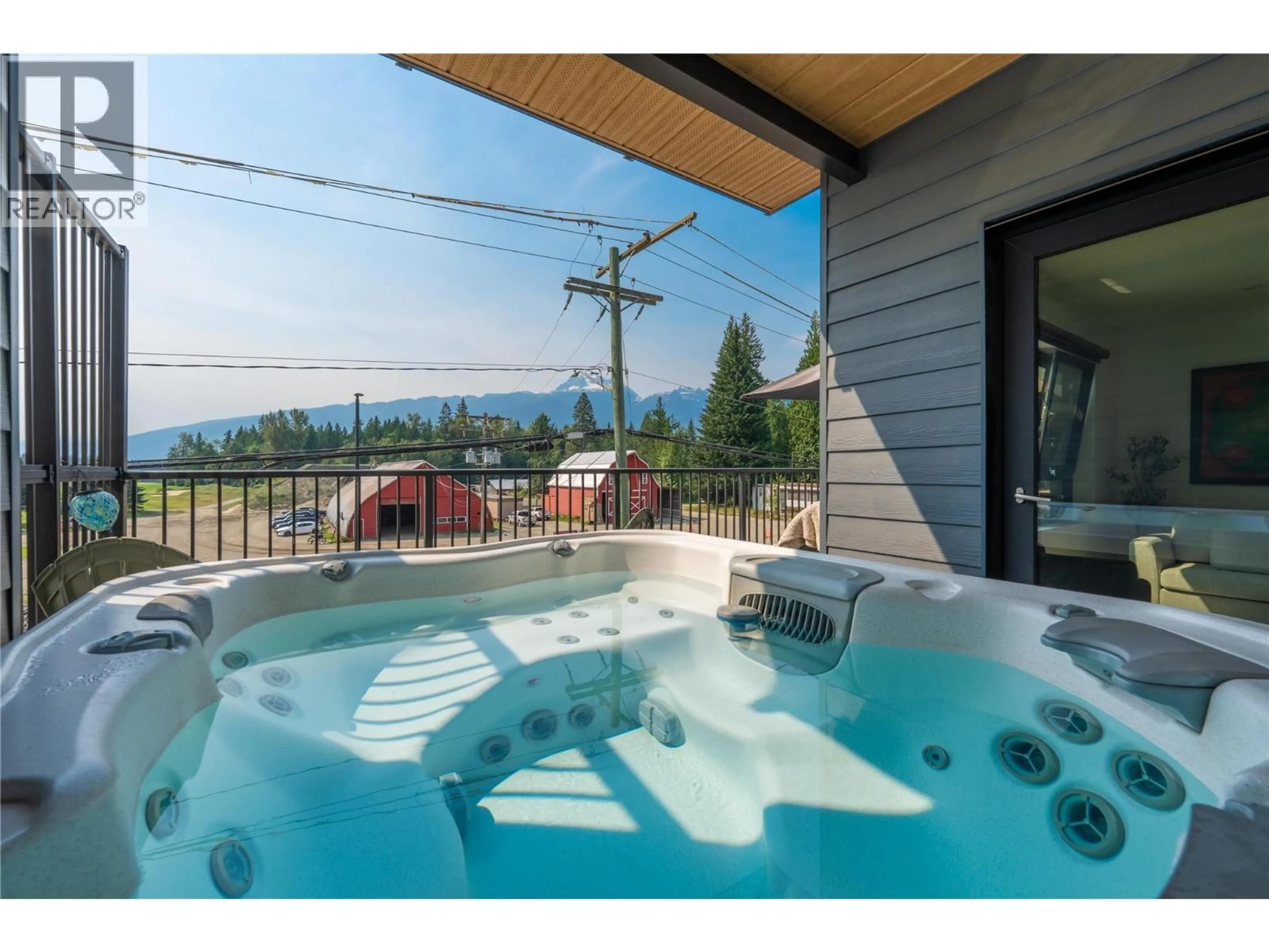 Patio, water/lake/river/ocean view for 2213 - 1701 COURSIER AVENUE, Revelstoke British Columbia V0E2S1