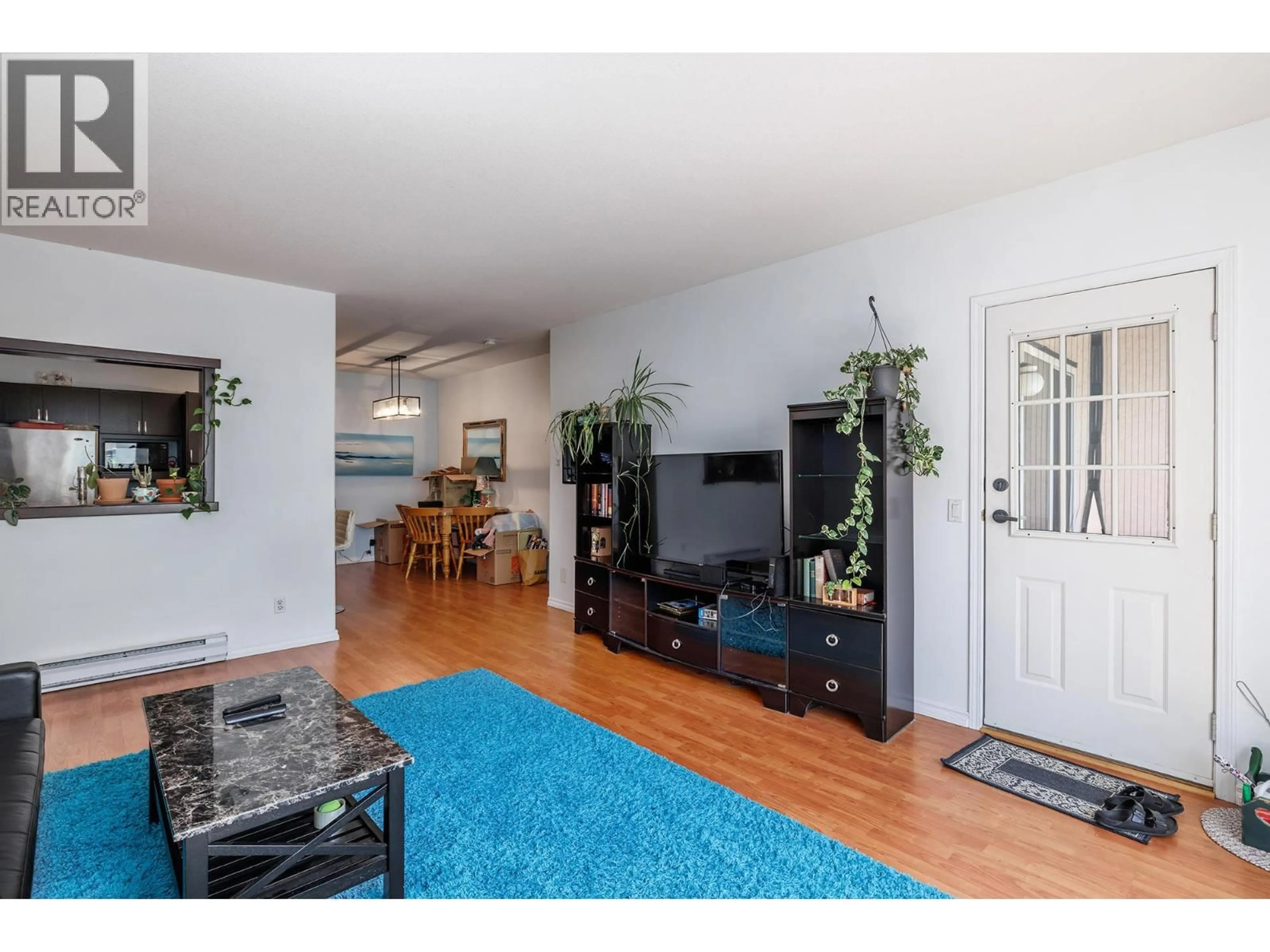 Living room with furniture, unknown for 214 - 985 KLO ROAD, Kelowna British Columbia V1Y9L2