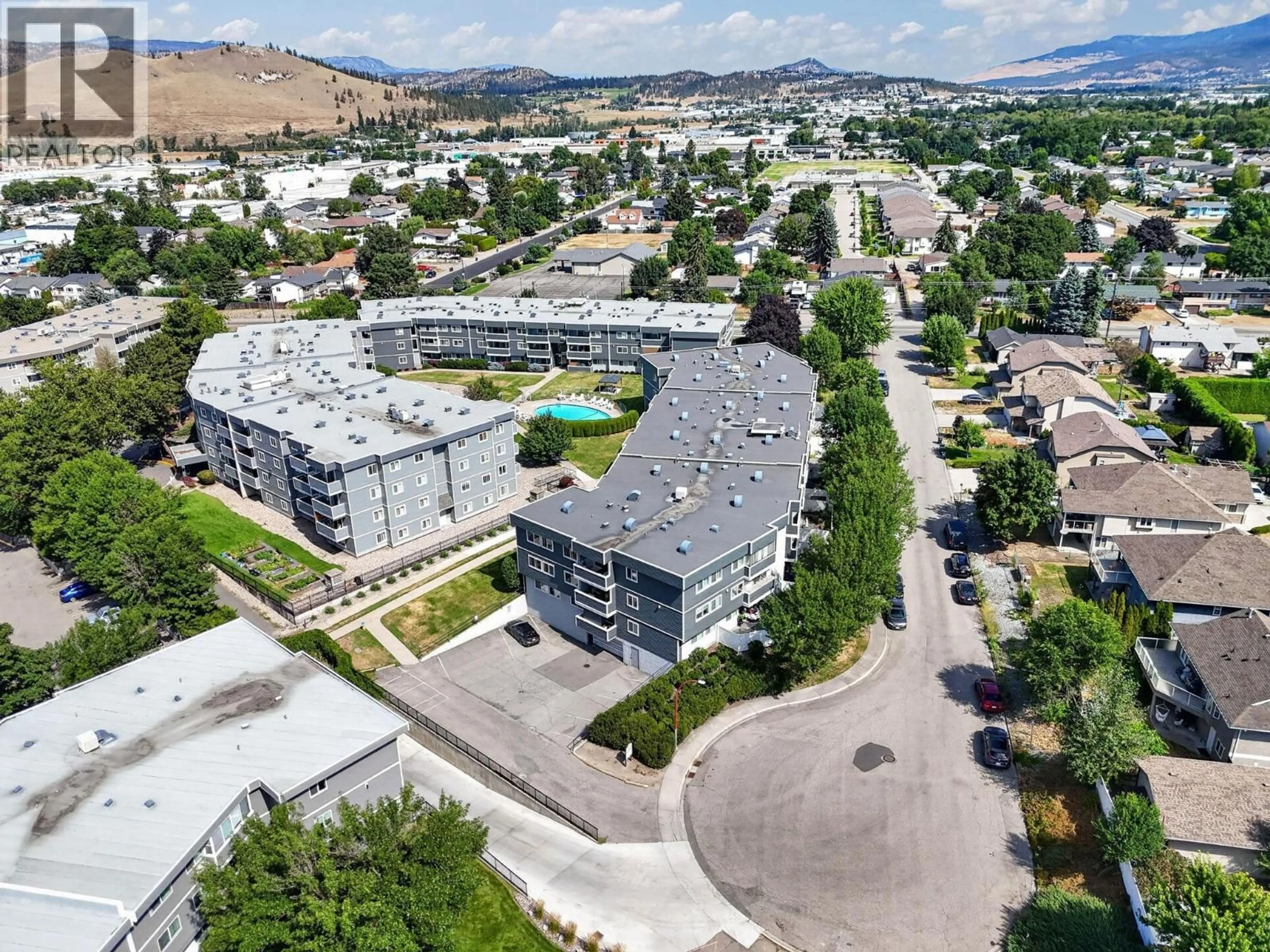 A pic from outside/outdoor area/front of a property/back of a property/a pic from drone, mountain view for 336 - 495 ALL STAR COURT, Kelowna British Columbia V1X5N7