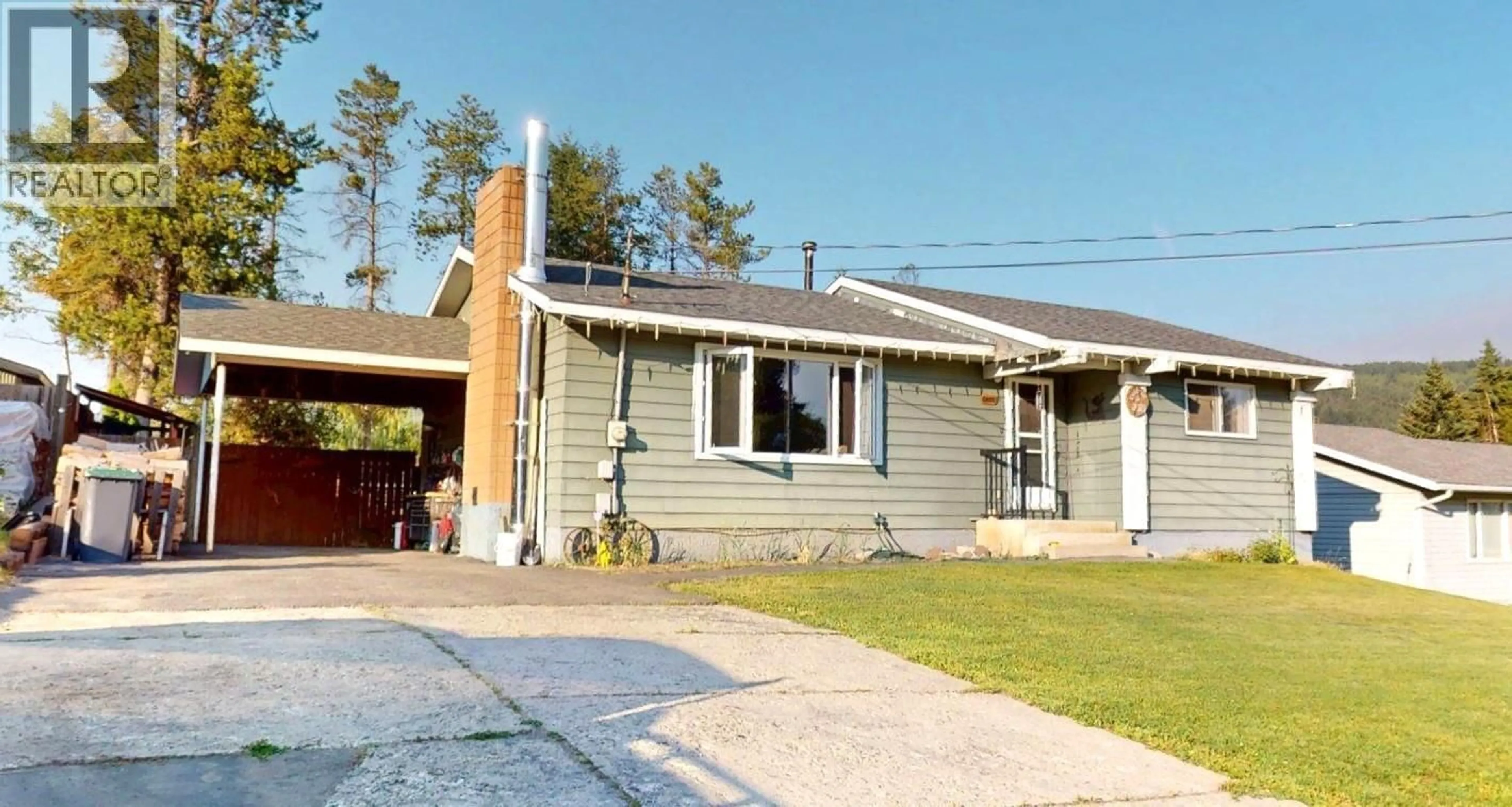 Home with vinyl exterior material, street for 2405 ARBUTUS STREET, Elkford British Columbia V0B1H0