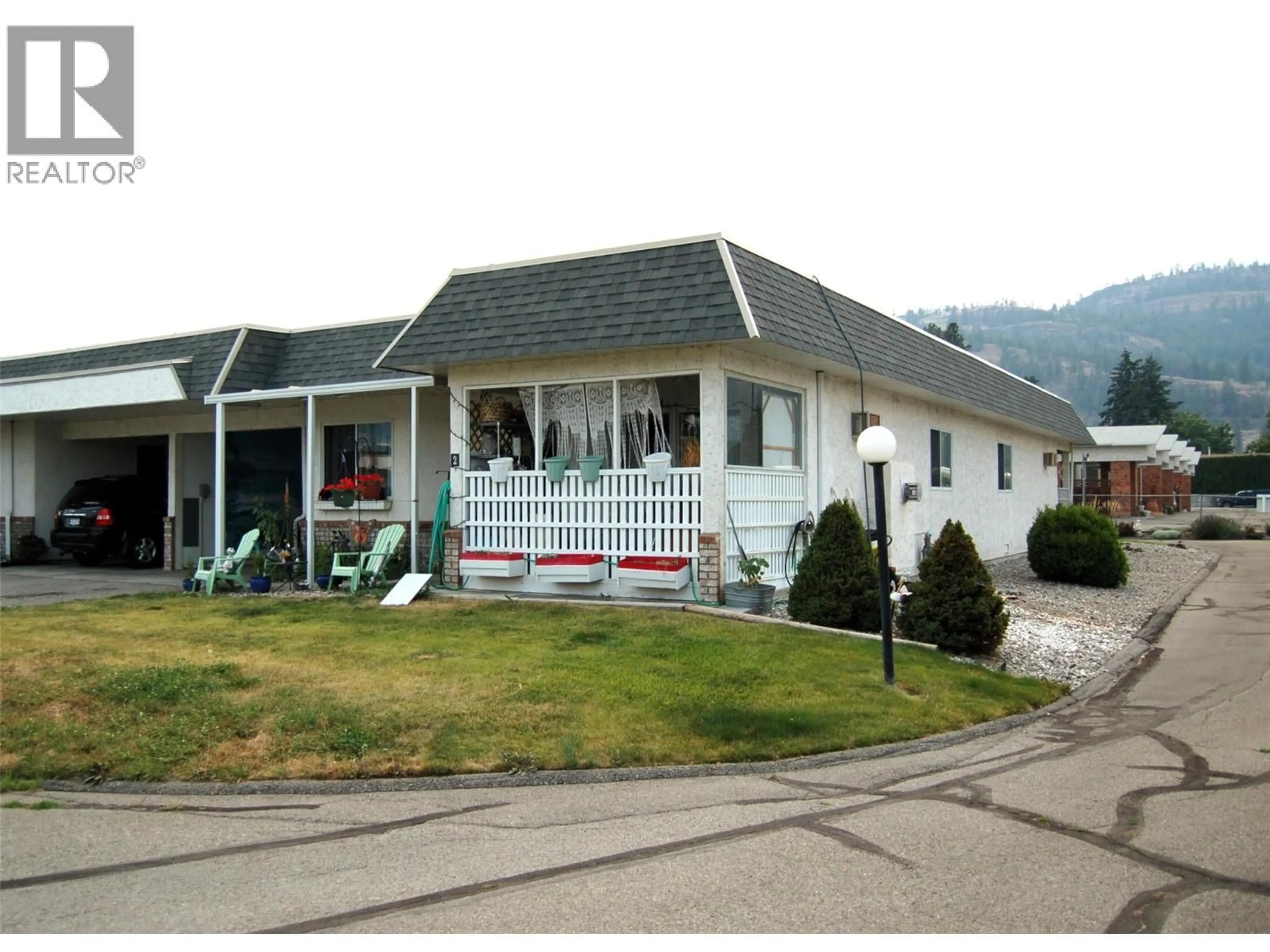 Home with vinyl exterior material, mountain view for 2 - 11110 QUINPOOL ROAD, Summerland British Columbia V0H1Z5