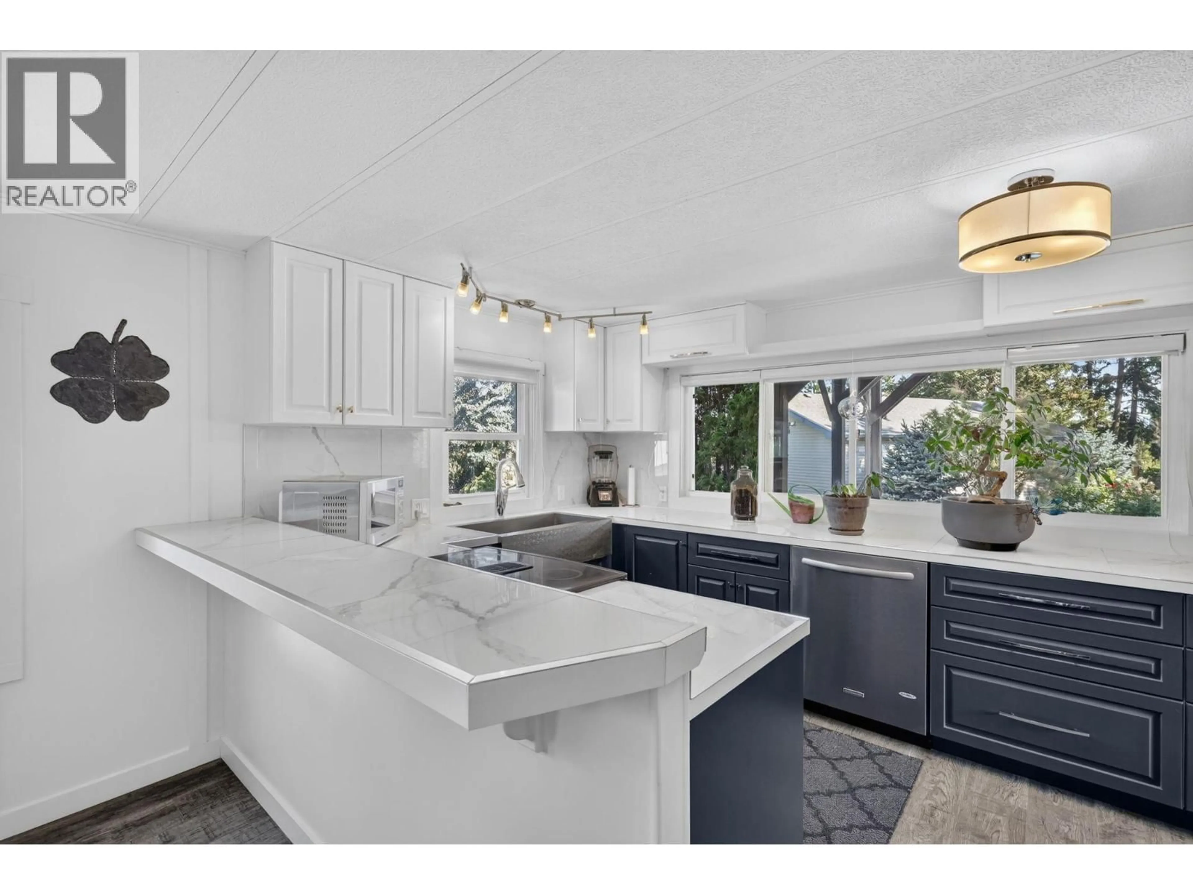 Open concept kitchen, ceramic/tile floor for 50 - 4075 MCCLAIN ROAD, Kelowna British Columbia V1W4R4