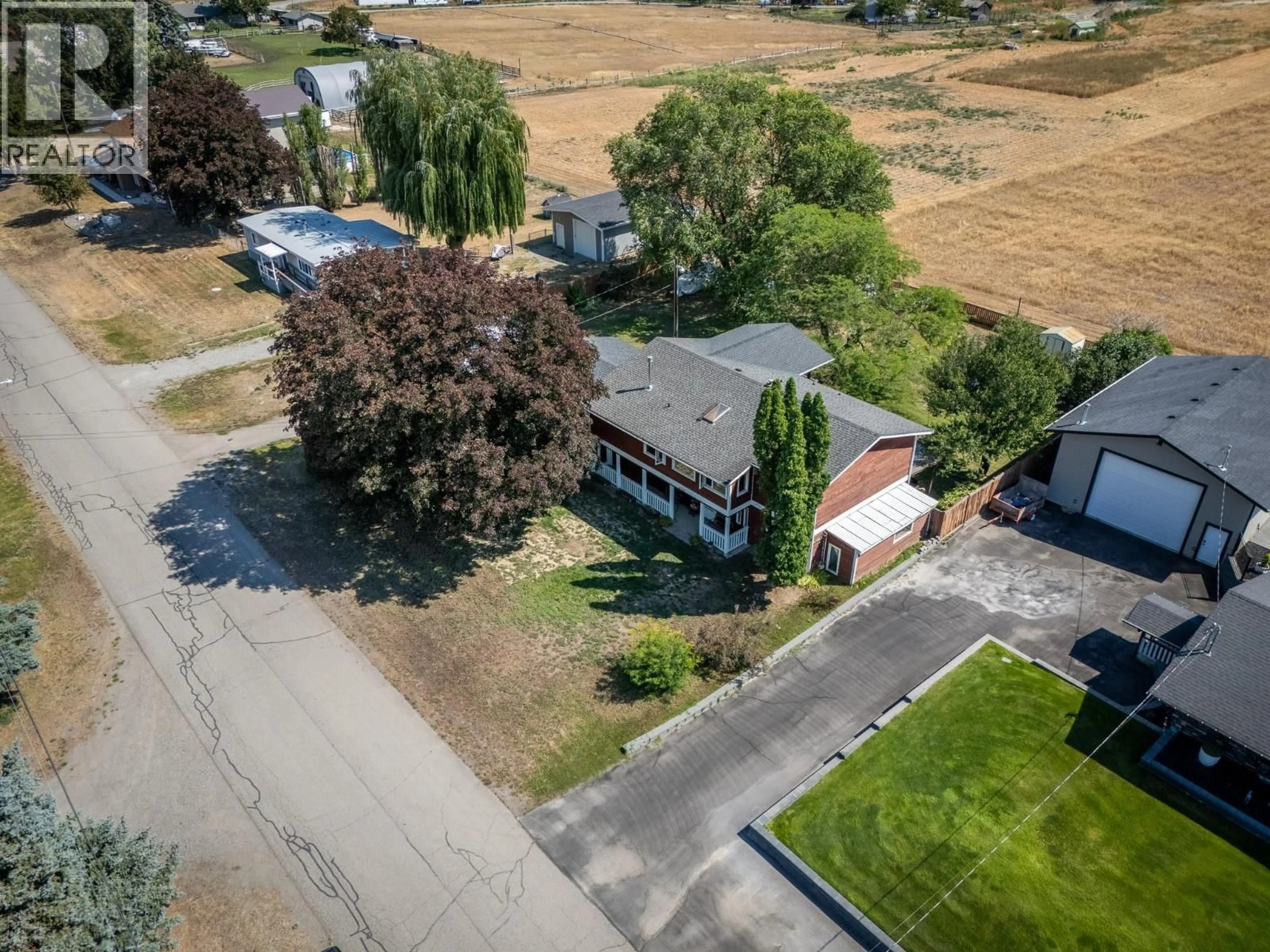 A pic from outside/outdoor area/front of a property/back of a property/a pic from drone, street for 6750 HEFFLEY ROAD, Kamloops British Columbia V2H0B4