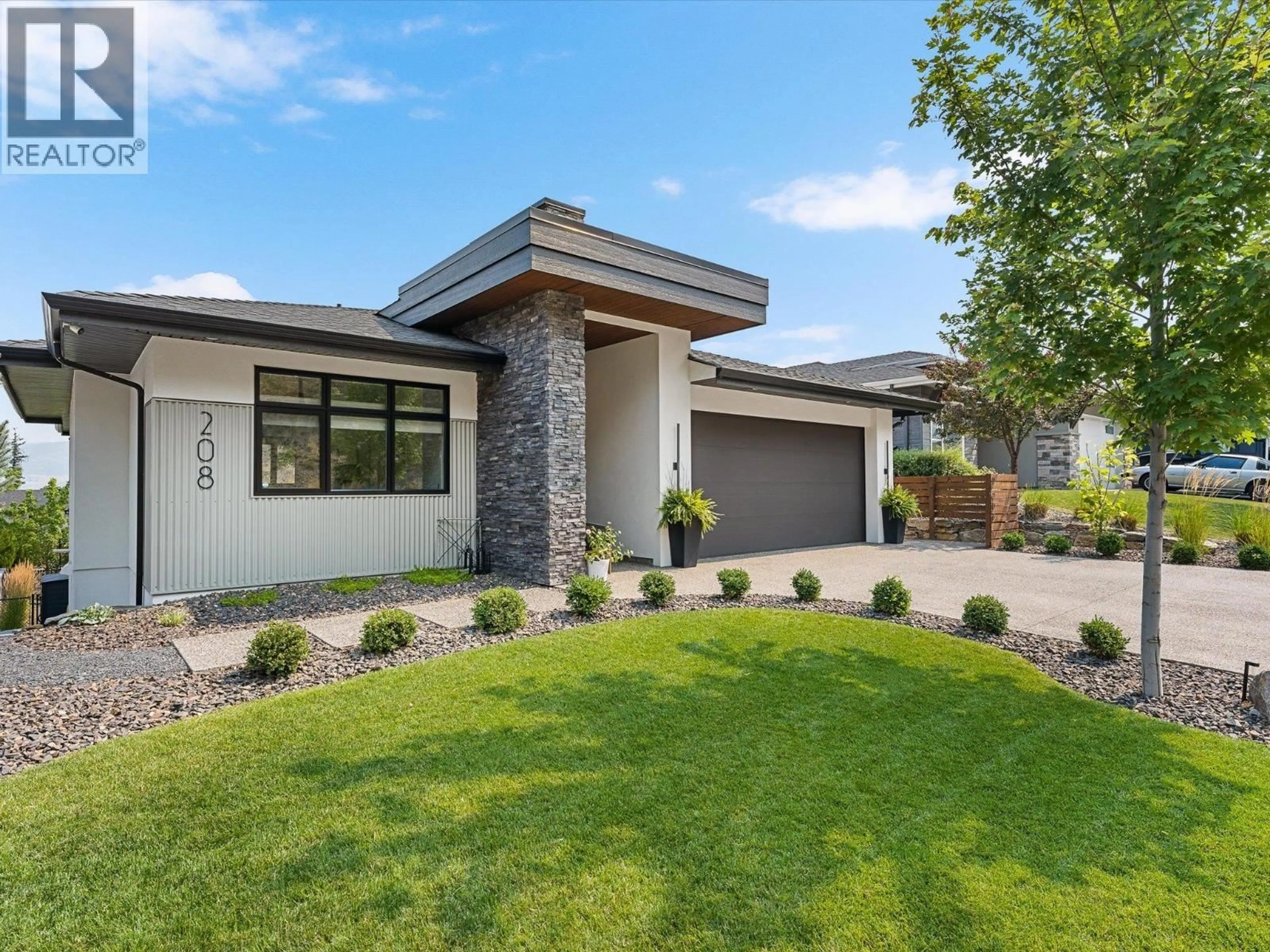 Home with brick exterior material, street for 208 SKYLAND DRIVE, Kelowna British Columbia V1V0C9