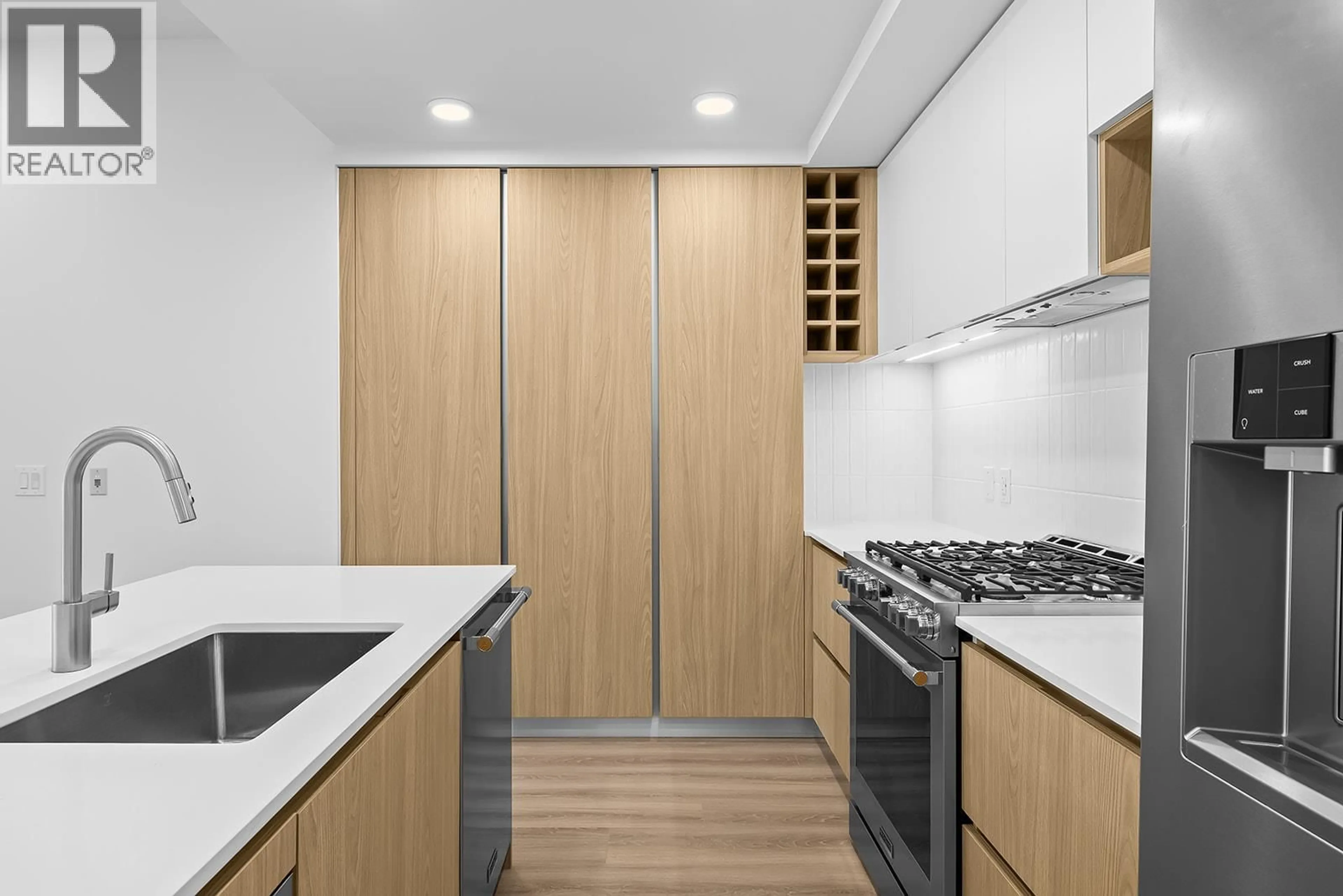 Standard kitchen, wood/laminate floor for 104 - 2780 OLALLA ROAD, West Kelowna British Columbia V1Z2A9