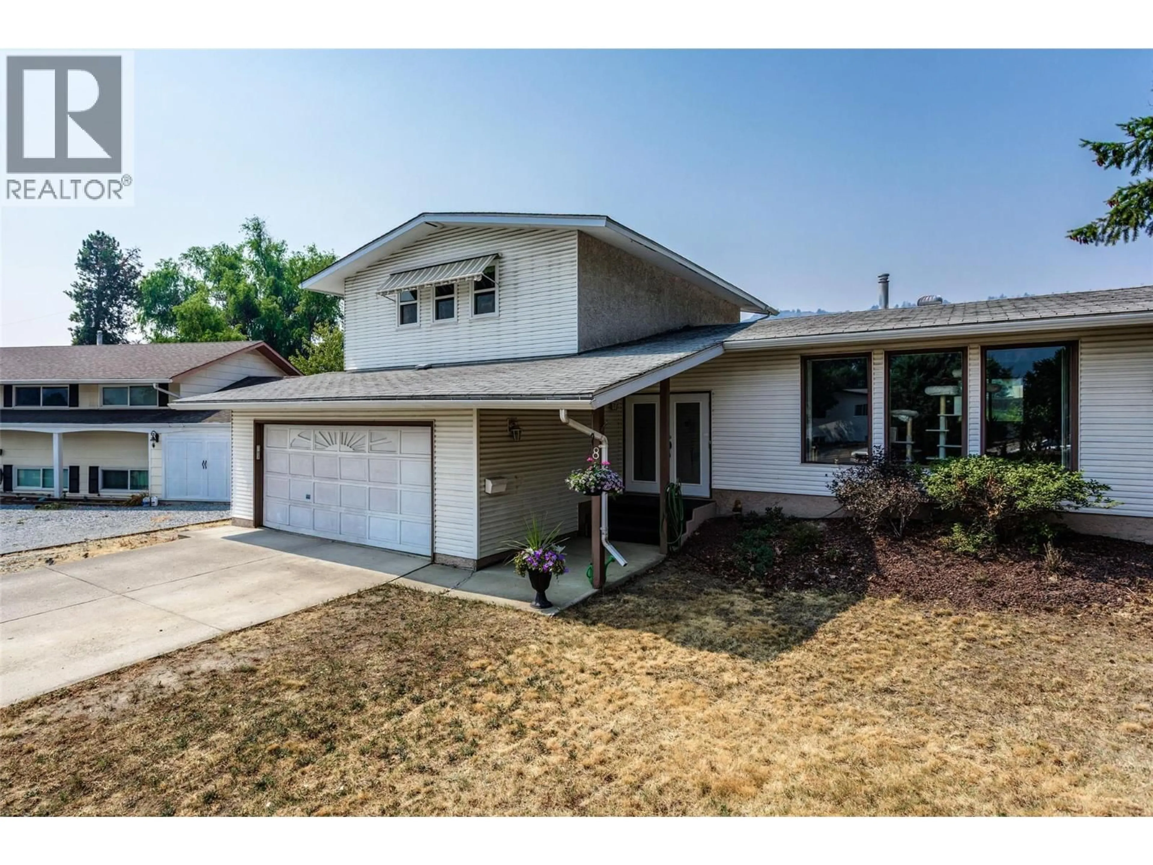 Home with vinyl exterior material, street for 840 LIBAN COURT, Kelowna British Columbia V1Y8B5