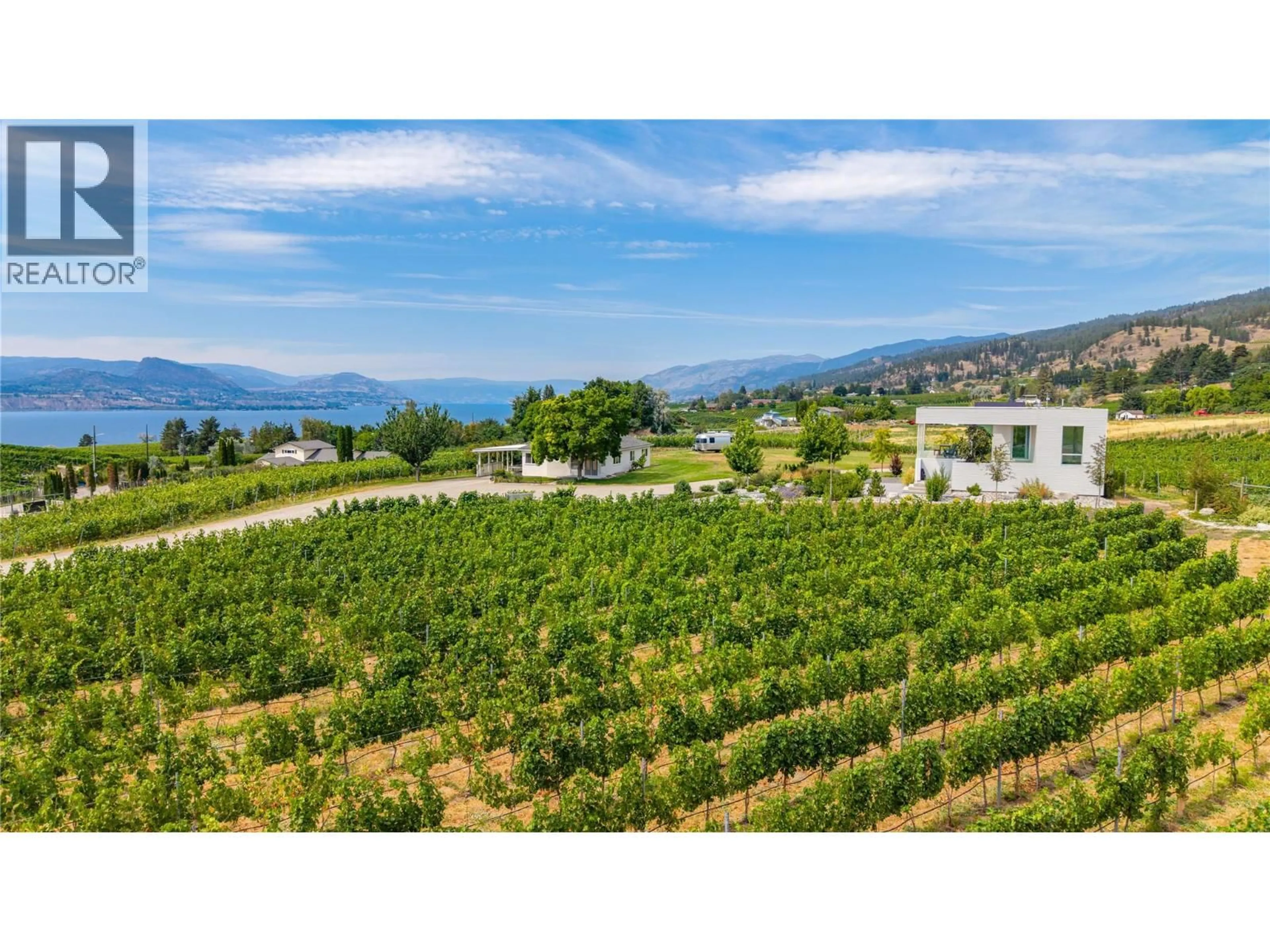 A pic from outside/outdoor area/front of a property/back of a property/a pic from drone, mountain view for 1243 EVANS AVENUE, Penticton British Columbia V2A8R7