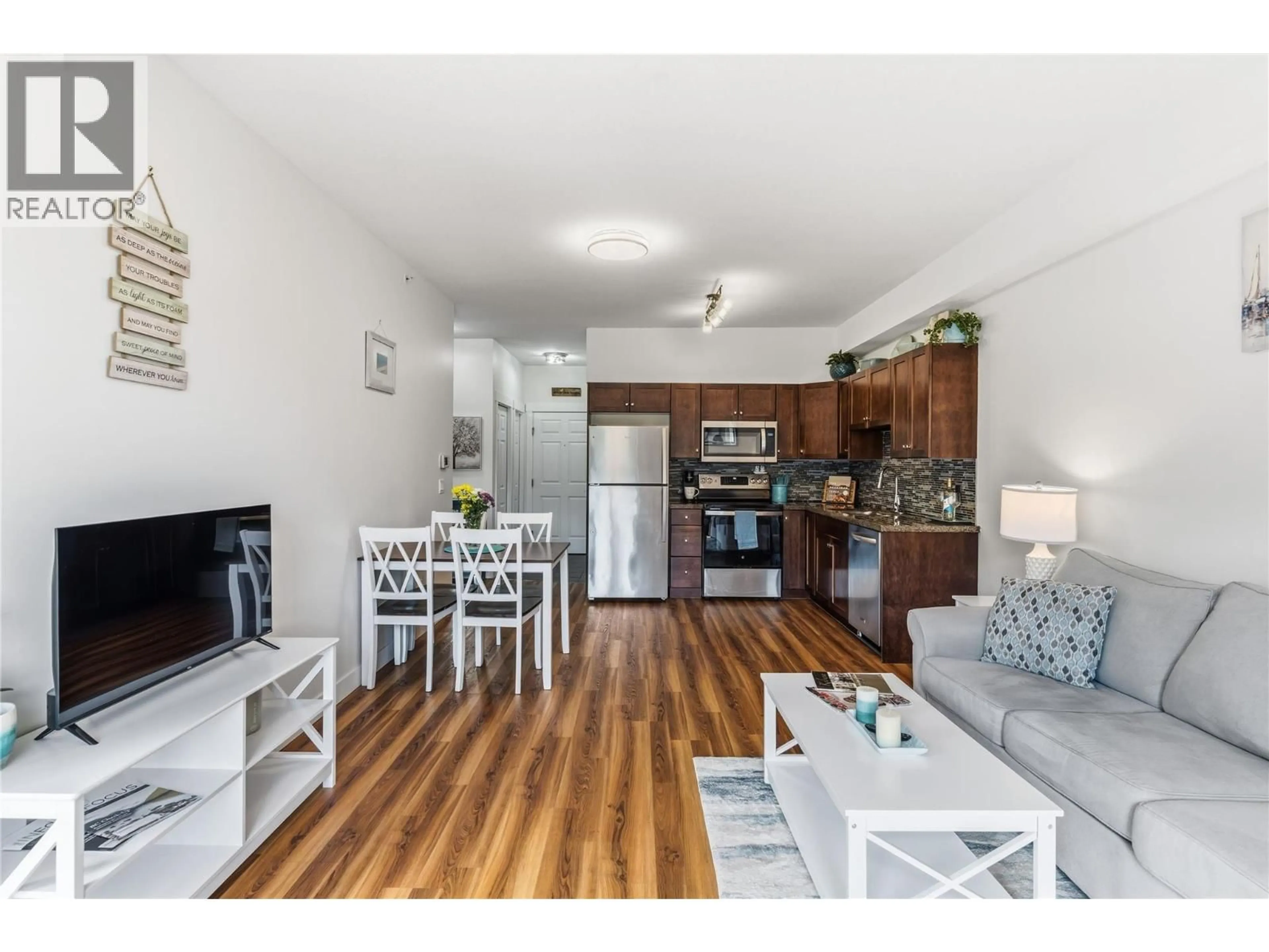 Open concept kitchen, wood/laminate floor for 1405 - 1875 COUNTRY CLUB DRIVE, Kelowna British Columbia V1V2W7