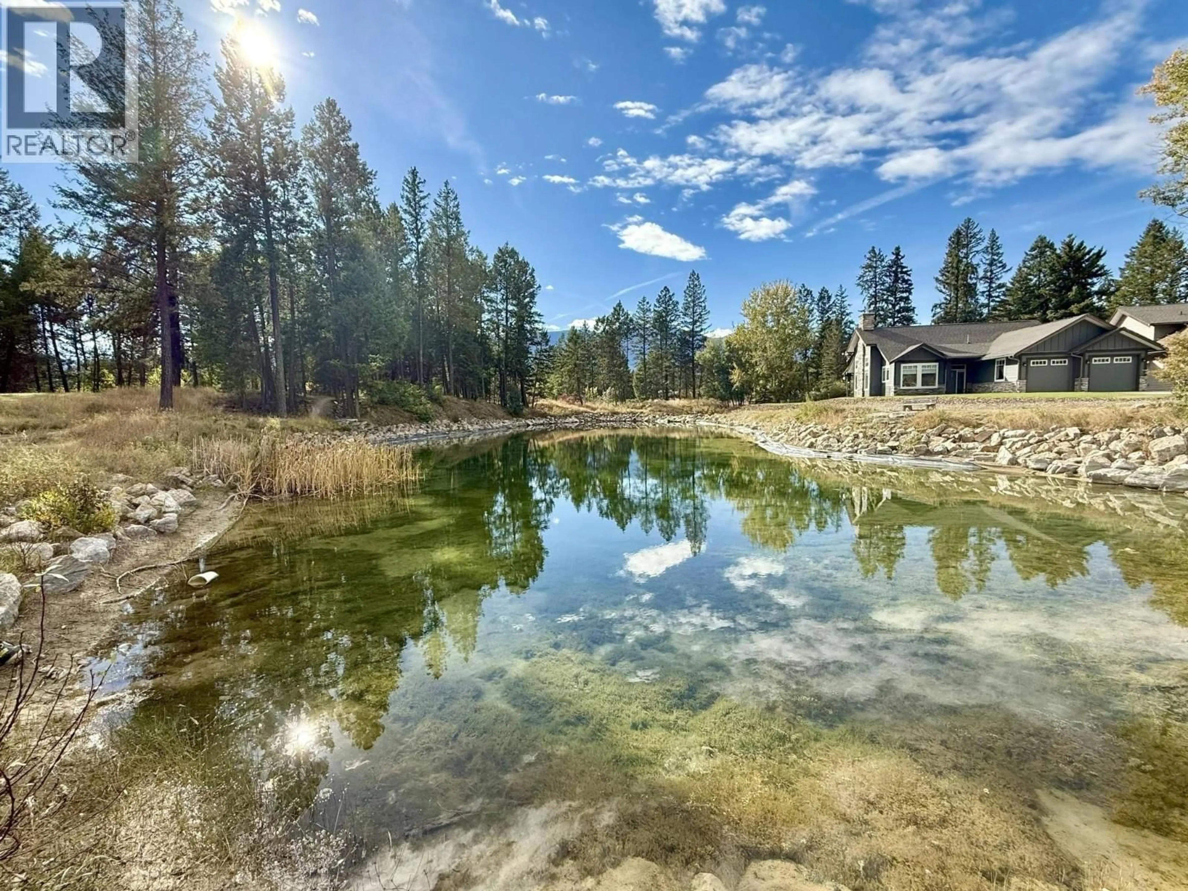 A pic from outside/outdoor area/front of a property/back of a property/a pic from drone, water/lake/river/ocean view for 1814 FOXWOOD TRAIL, Windermere British Columbia V0B2L2