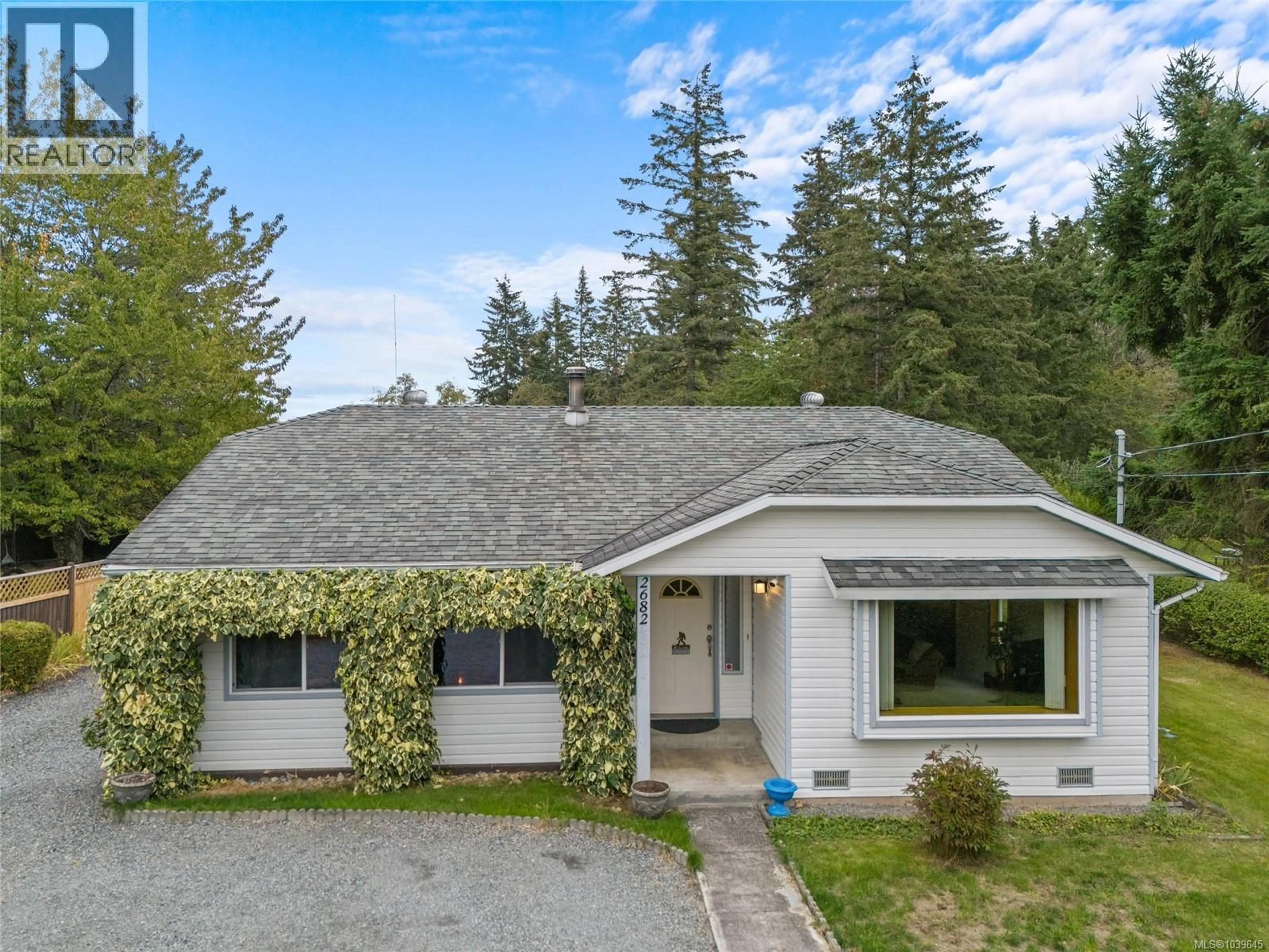 A pic from outside/outdoor area/front of a property/back of a property/a pic from drone, street for 2682 LABIEUX ROAD, Nanaimo British Columbia V9T3N4