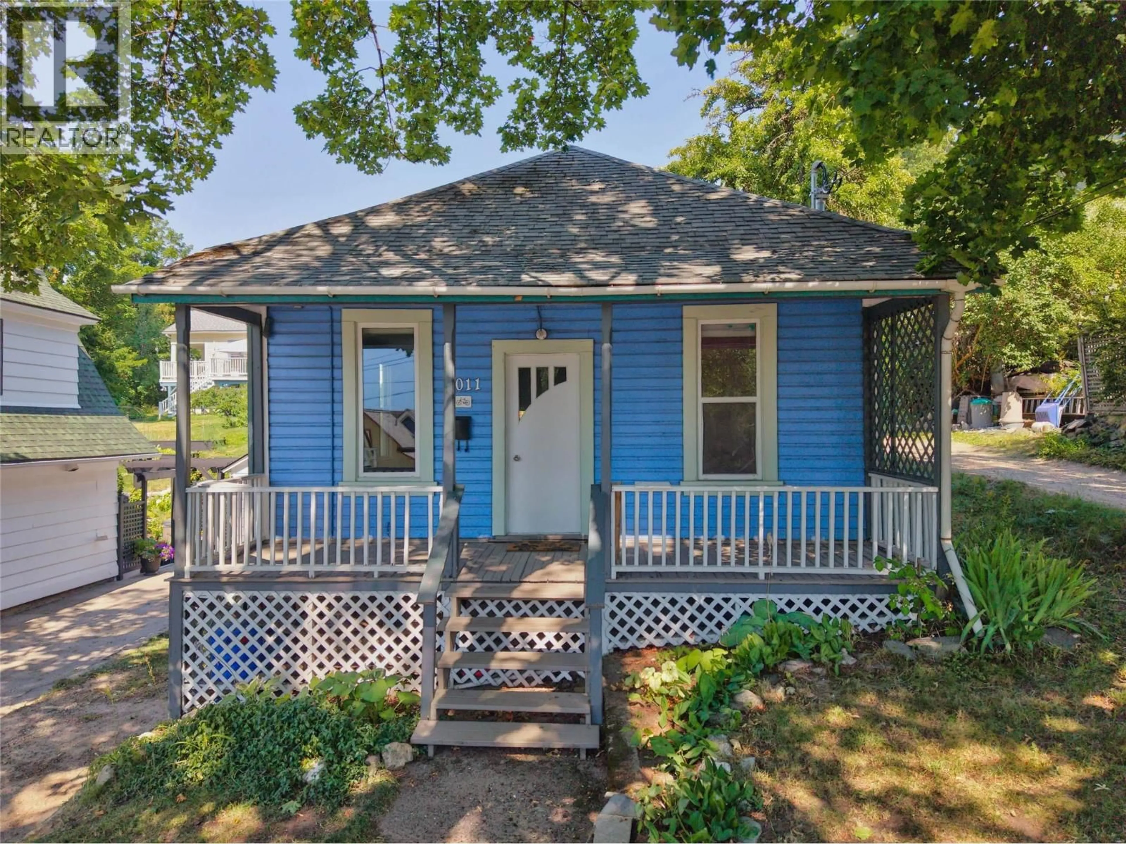 Home with vinyl exterior material, street for 1011 HALL STREET, Nelson British Columbia V1L1Z8