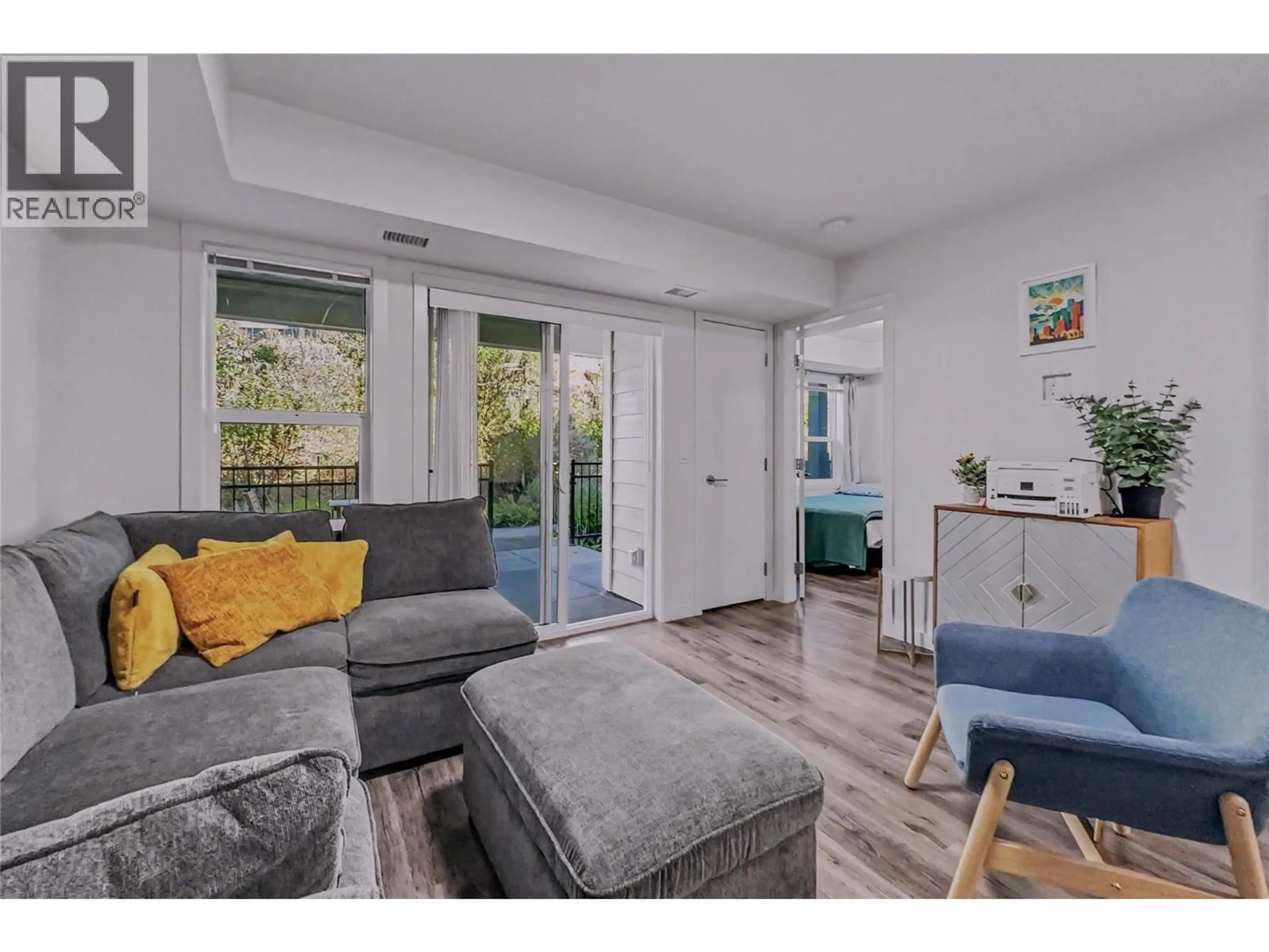 Living room with furniture, unknown for 115 - 725 ACADEMY WAY, Kelowna British Columbia V1V3E4