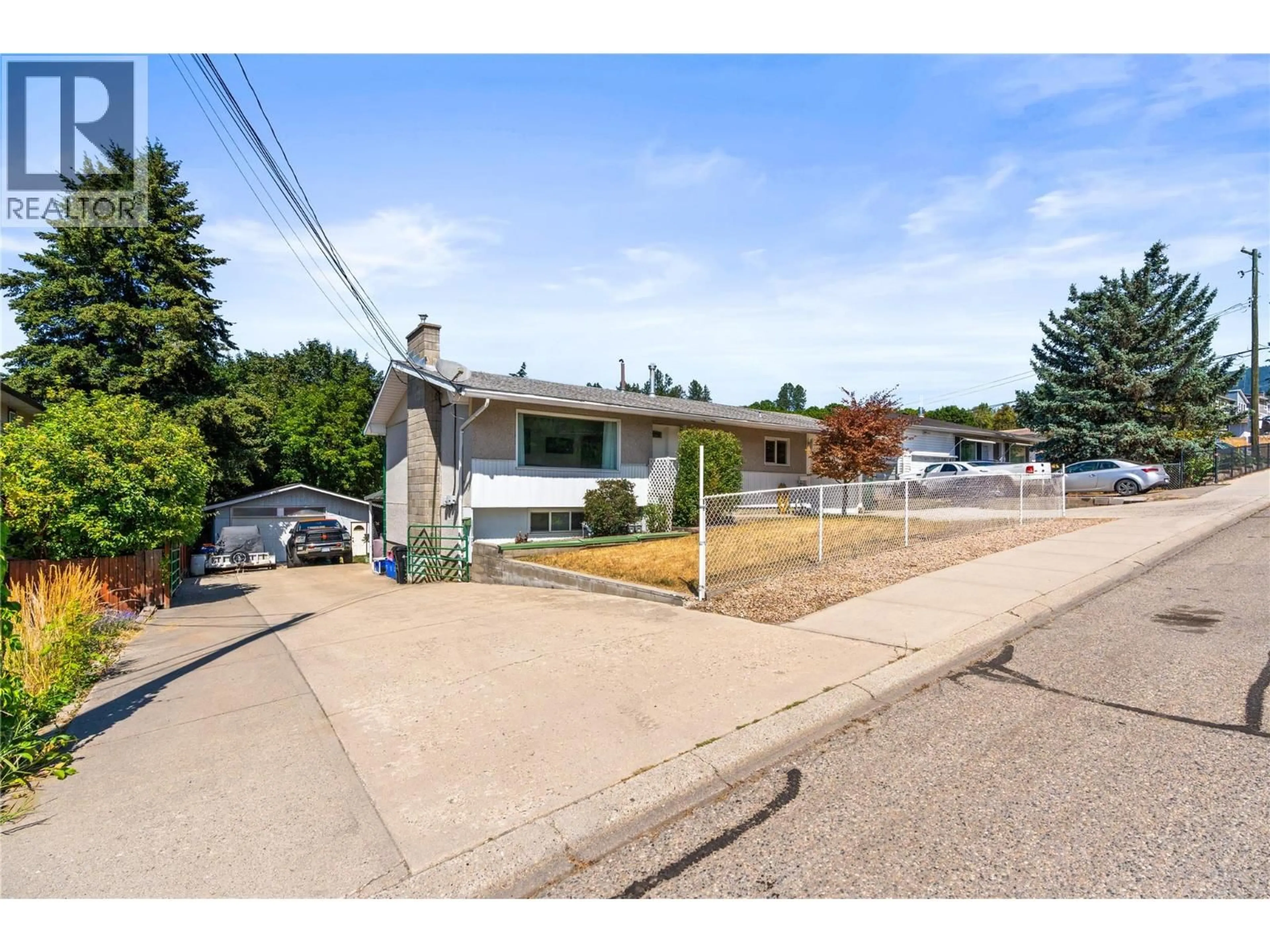 A pic from outside/outdoor area/front of a property/back of a property/a pic from drone, street for 1603 43RD AVENUE, Vernon British Columbia V1T3K2