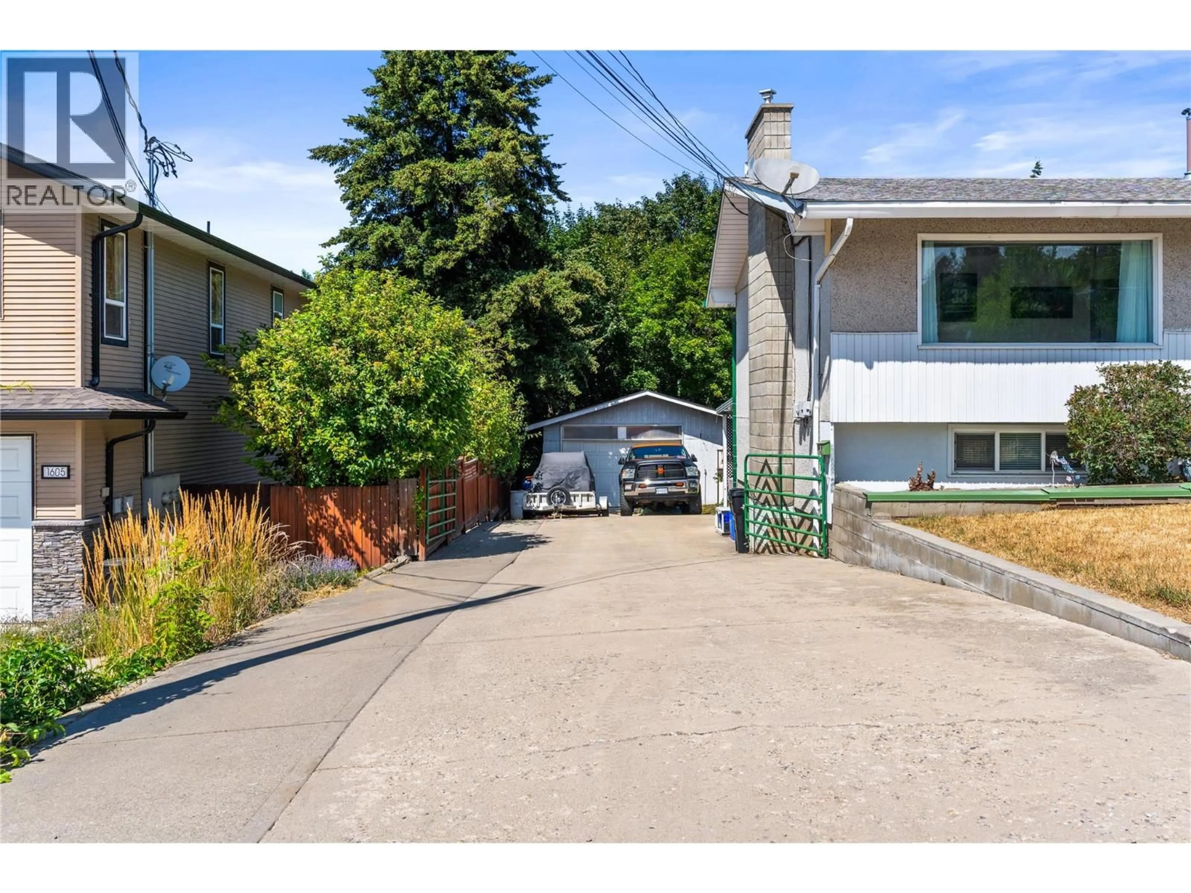 A pic from outside/outdoor area/front of a property/back of a property/a pic from drone, street for 1603 43RD AVENUE, Vernon British Columbia V1T3K2