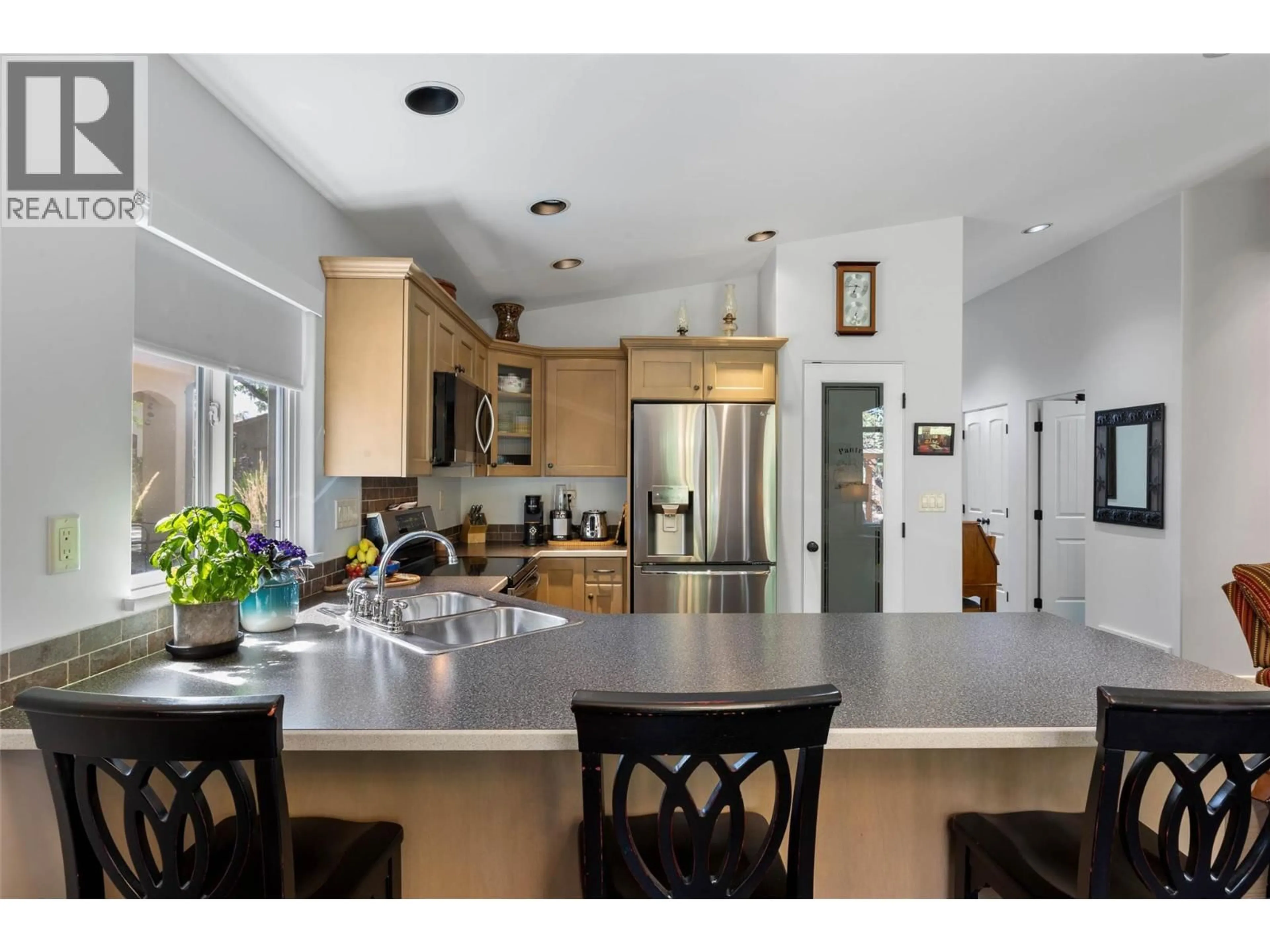 Open concept kitchen, ceramic/tile floor for 757 ROSEWOOD CRESCENT, Kamloops British Columbia V2H1S3