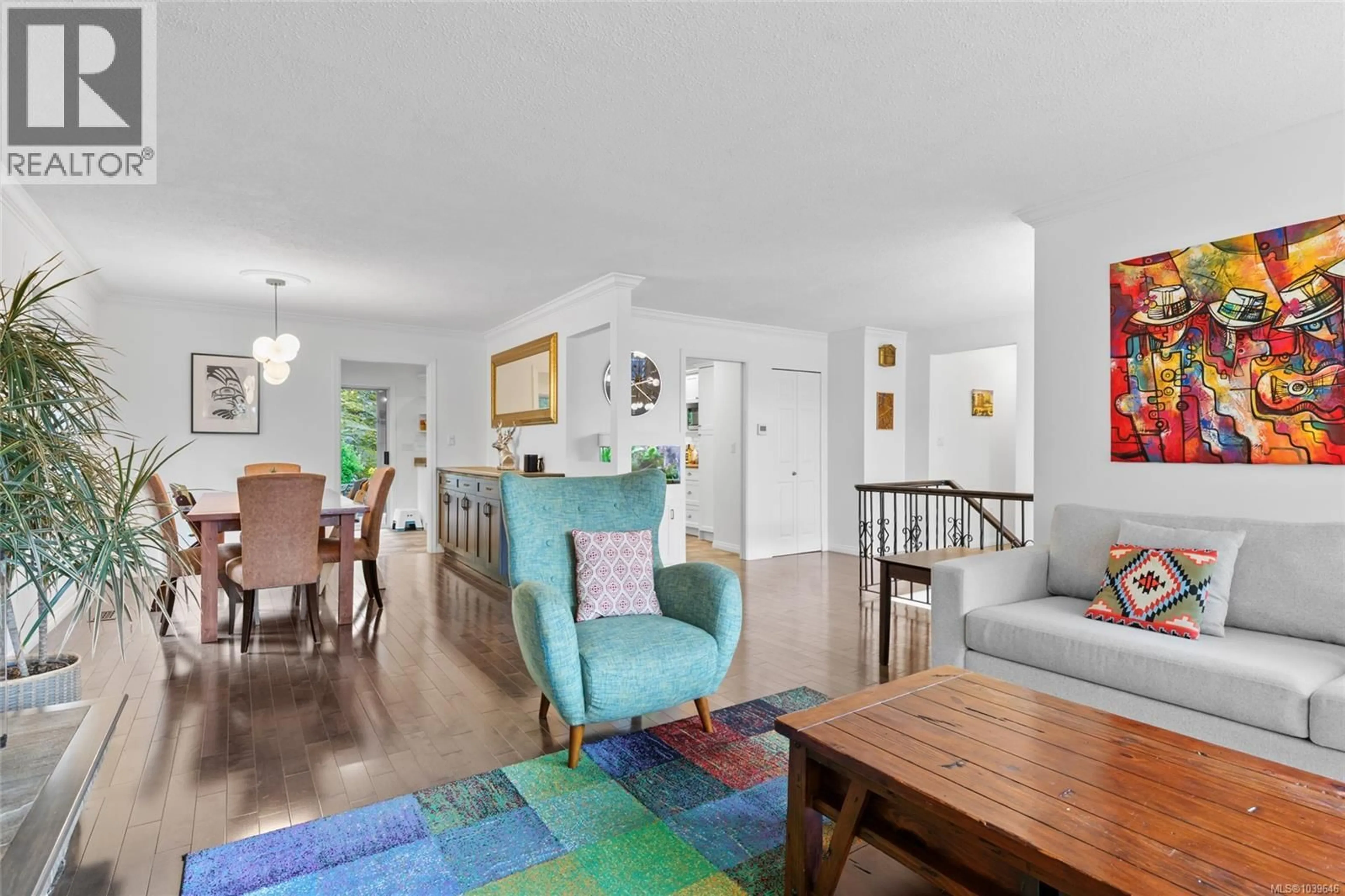 Living room with furniture, wood/laminate floor for 1644 BARKSDALE DRIVE, Saanich British Columbia V8N4Z8