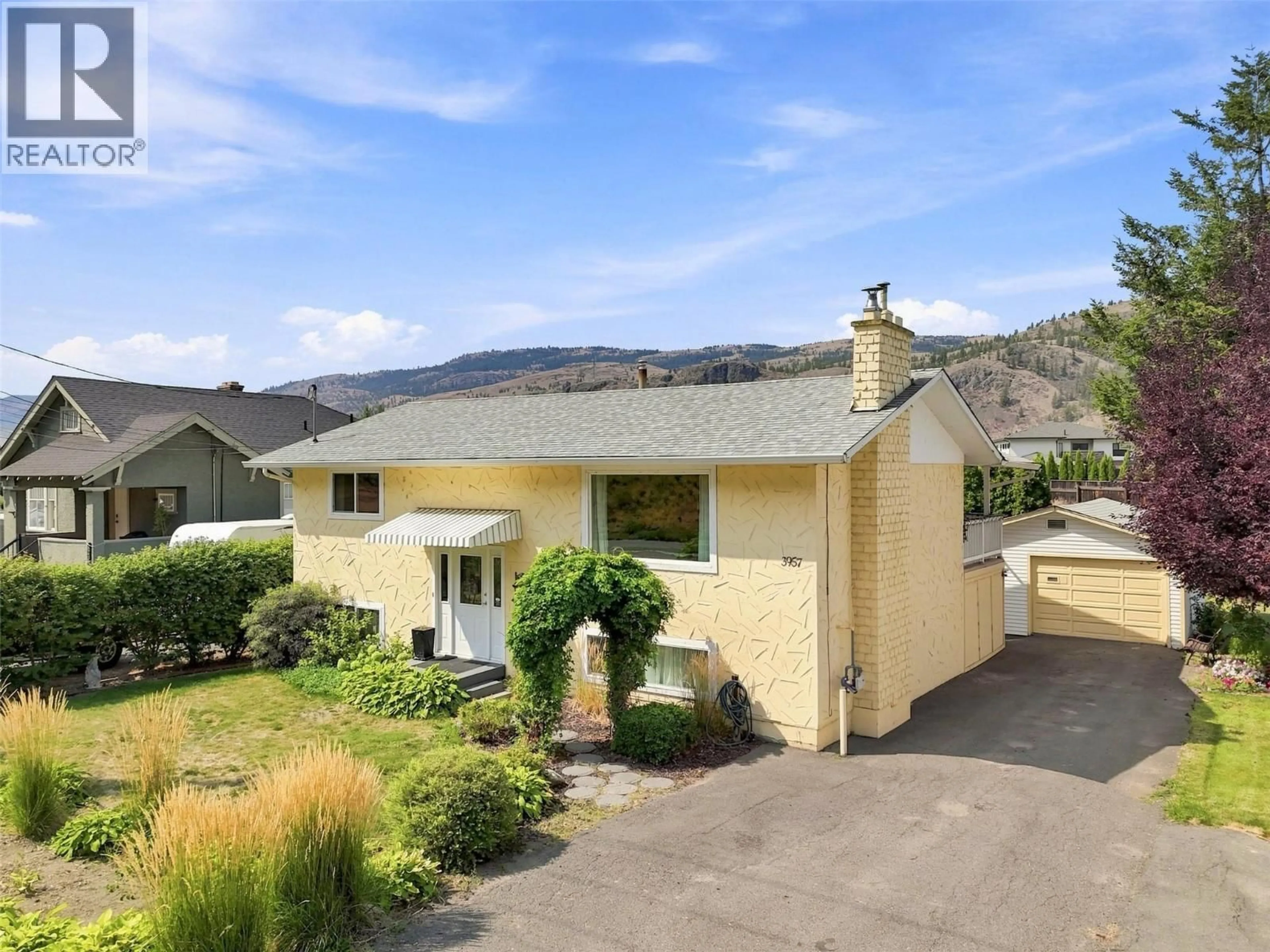 A pic from outside/outdoor area/front of a property/back of a property/a pic from drone, street for 3957 OLD YELLOWHEAD HIGHWAY, Kamloops British Columbia V2H1K6