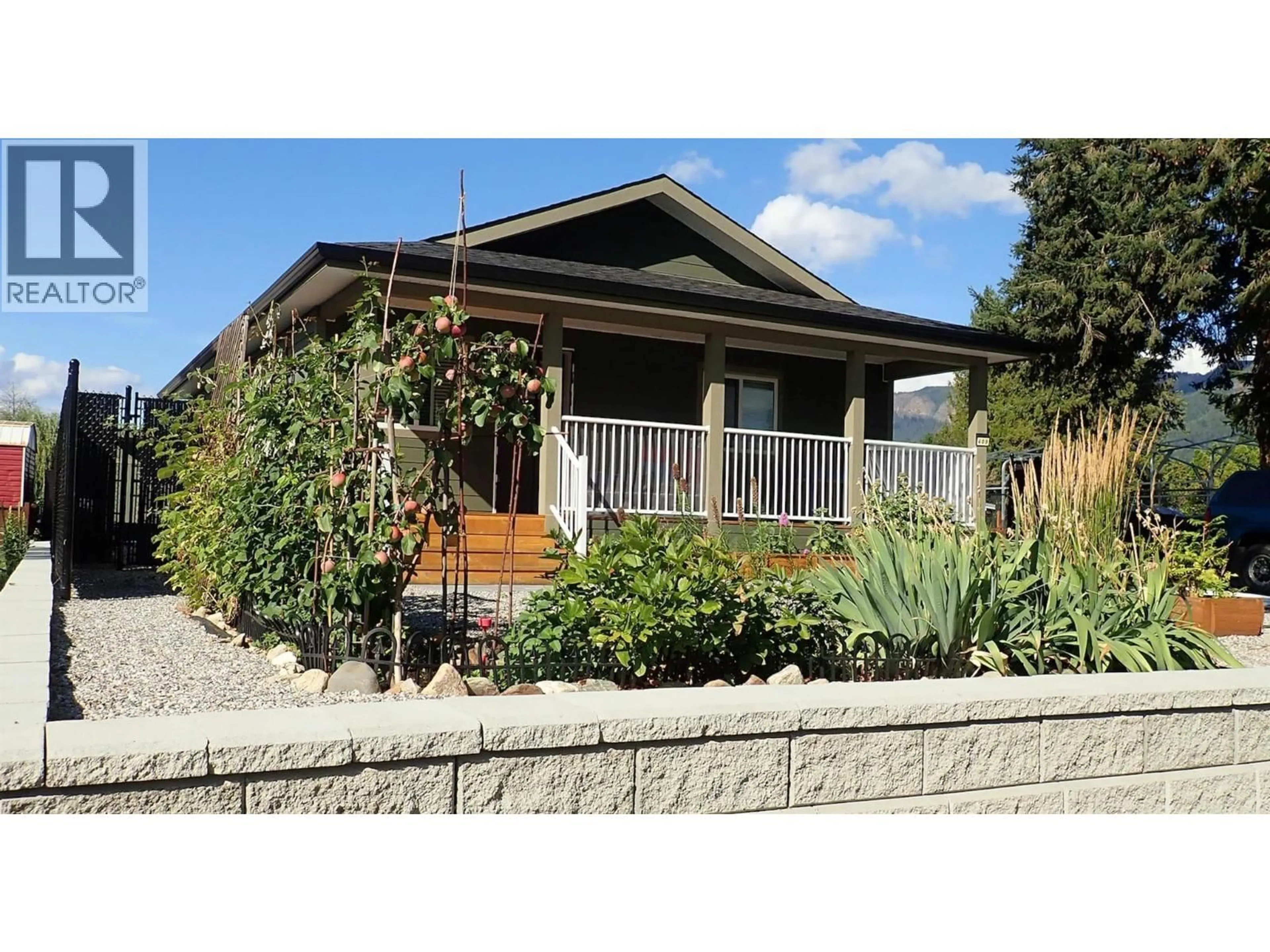 Home with vinyl exterior material, street for 409 POLSON AVENUE, Enderby British Columbia V0E1V2