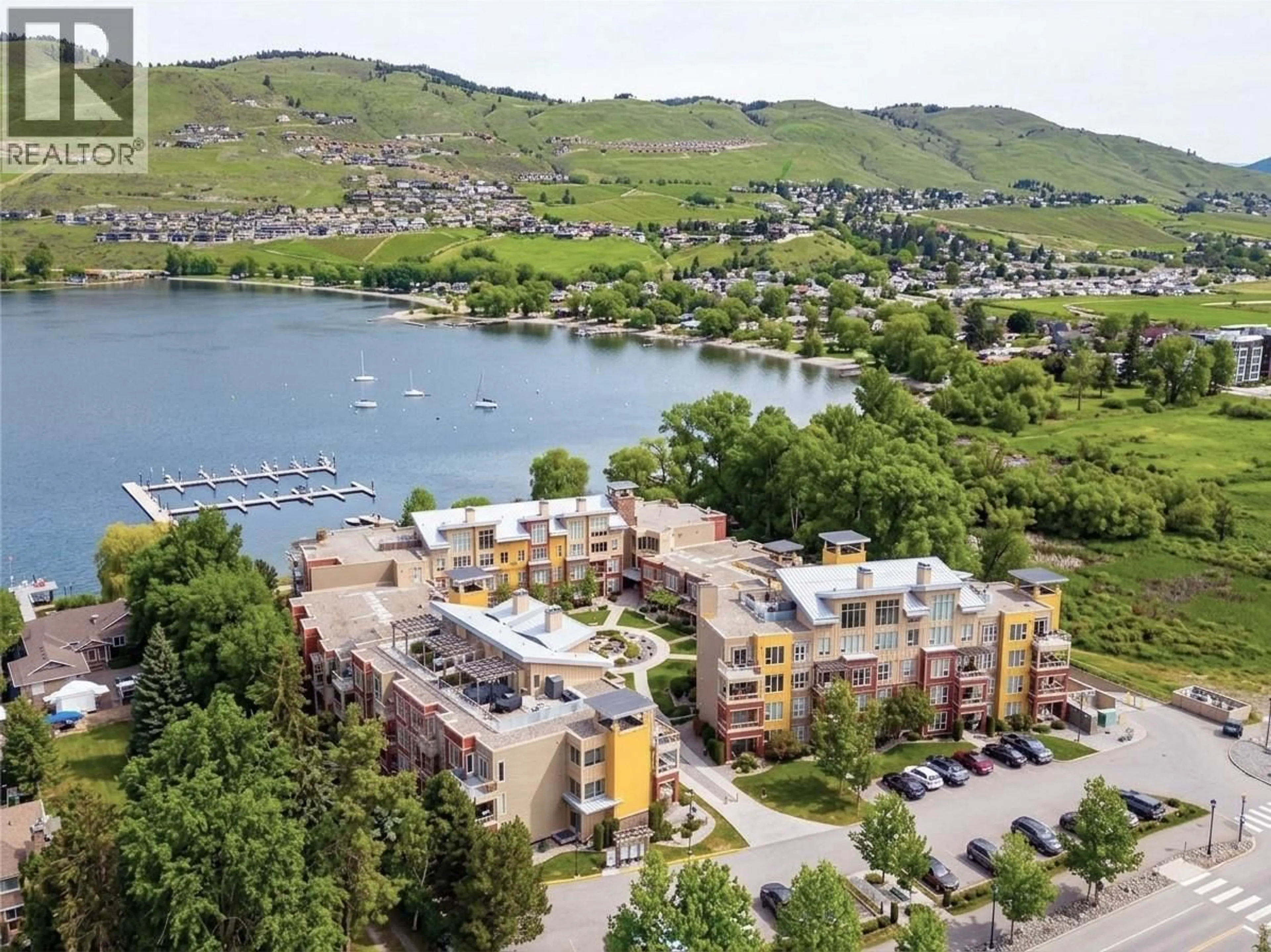 A pic from outside/outdoor area/front of a property/back of a property/a pic from drone, water/lake/river/ocean view for 2402 - 7343 OKANAGAN LANDING ROAD, Vernon British Columbia V1H2J6