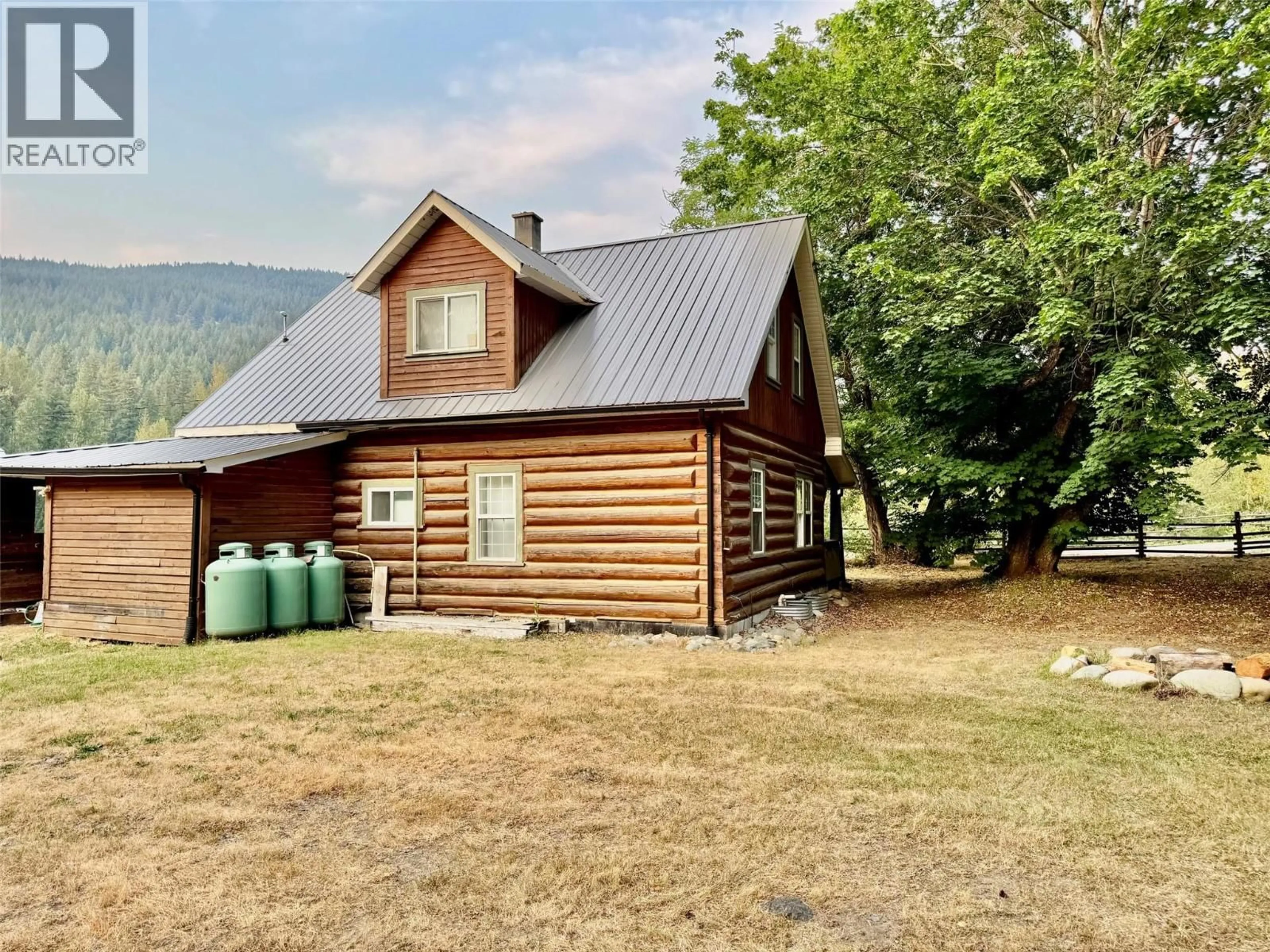 A pic from outside/outdoor area/front of a property/back of a property/a pic from drone, unknown for 159 NORTH FORK ROAD, Cherryville British Columbia V0E2G3