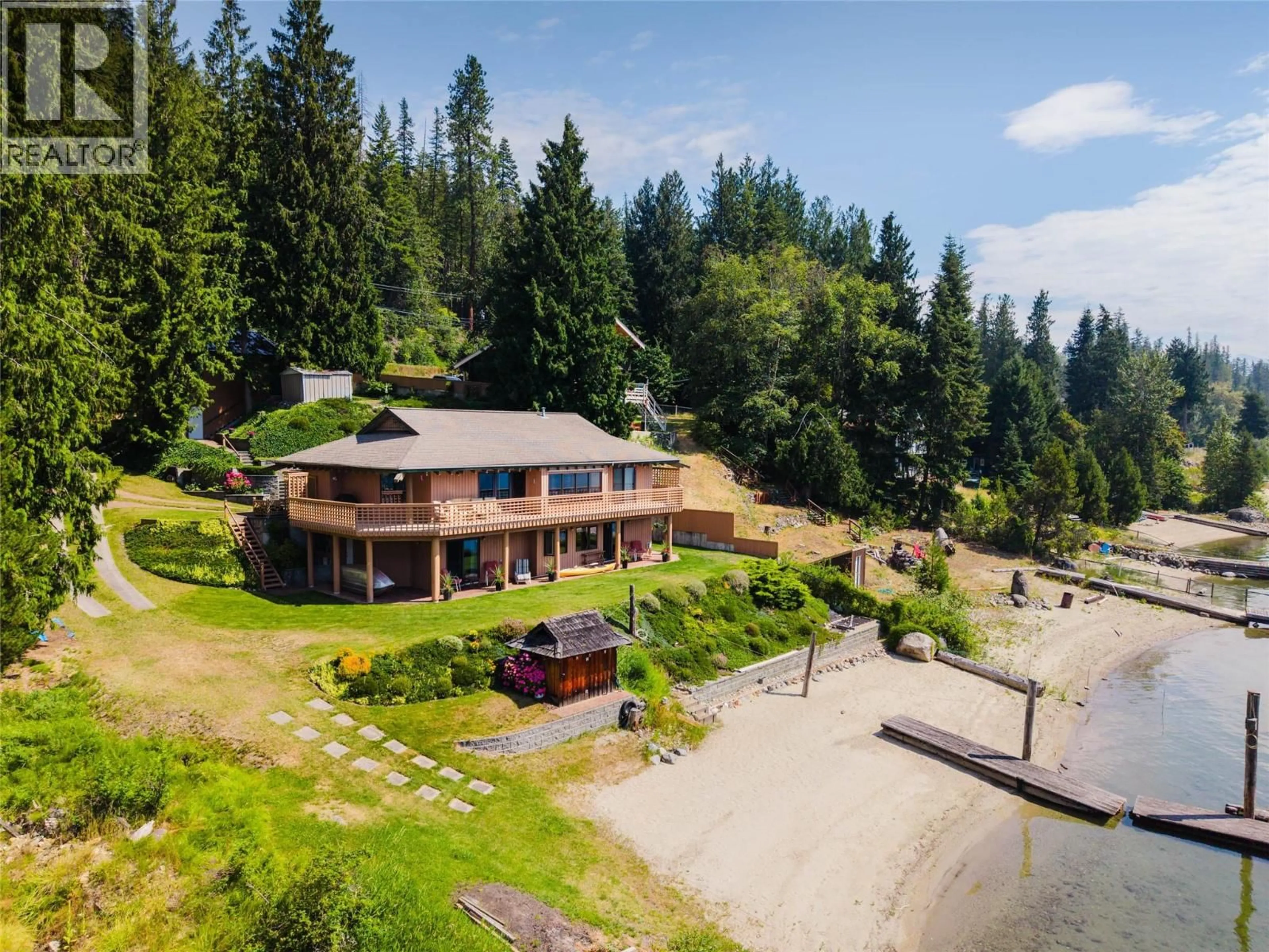 A pic from outside/outdoor area/front of a property/back of a property/a pic from drone, water/lake/river/ocean view for 6714 3A HIGHWAY, Nelson British Columbia V1L6S2