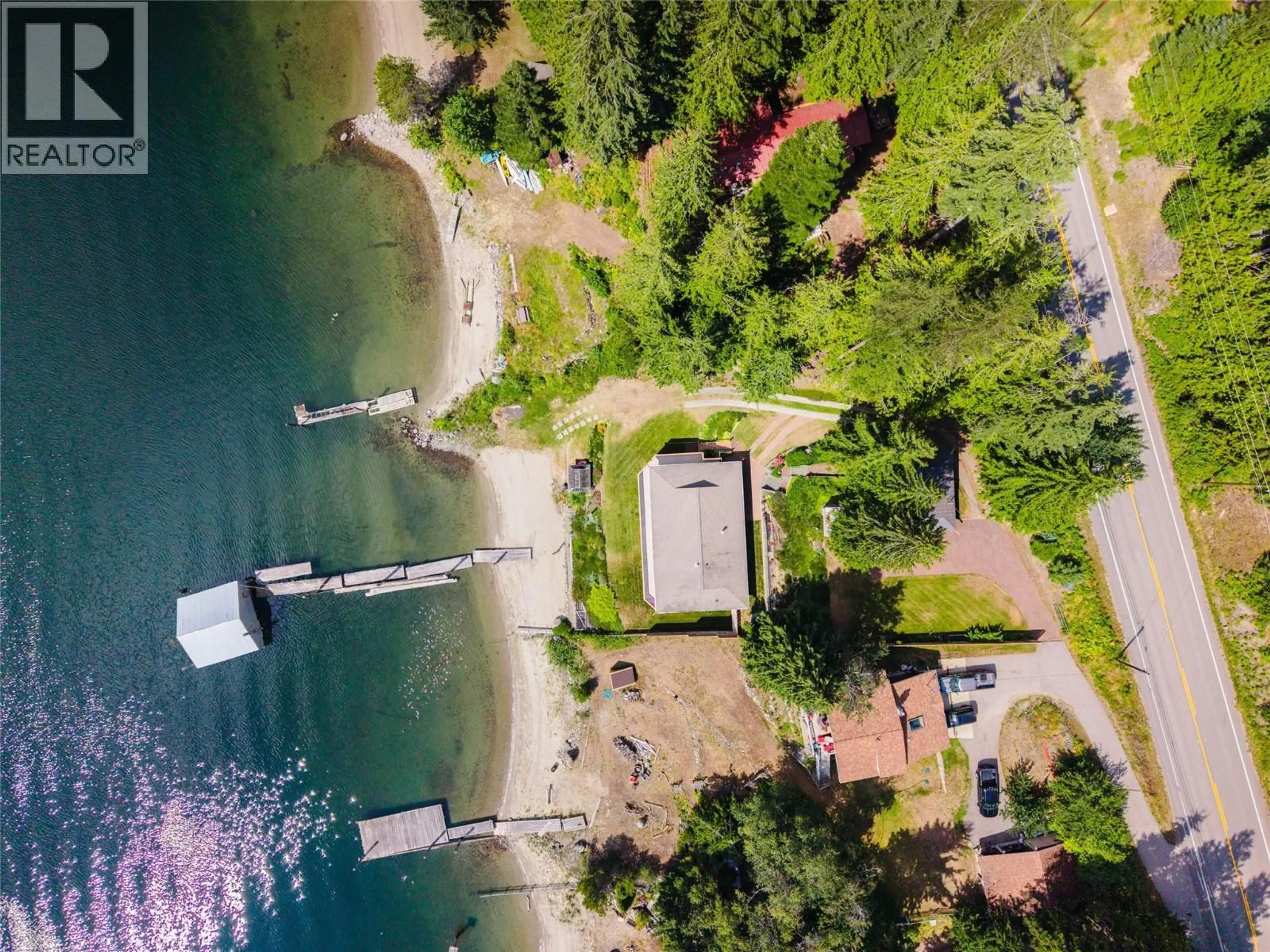 A pic from outside/outdoor area/front of a property/back of a property/a pic from drone, water/lake/river/ocean view for 6714 3A HIGHWAY, Nelson British Columbia V1L6S2