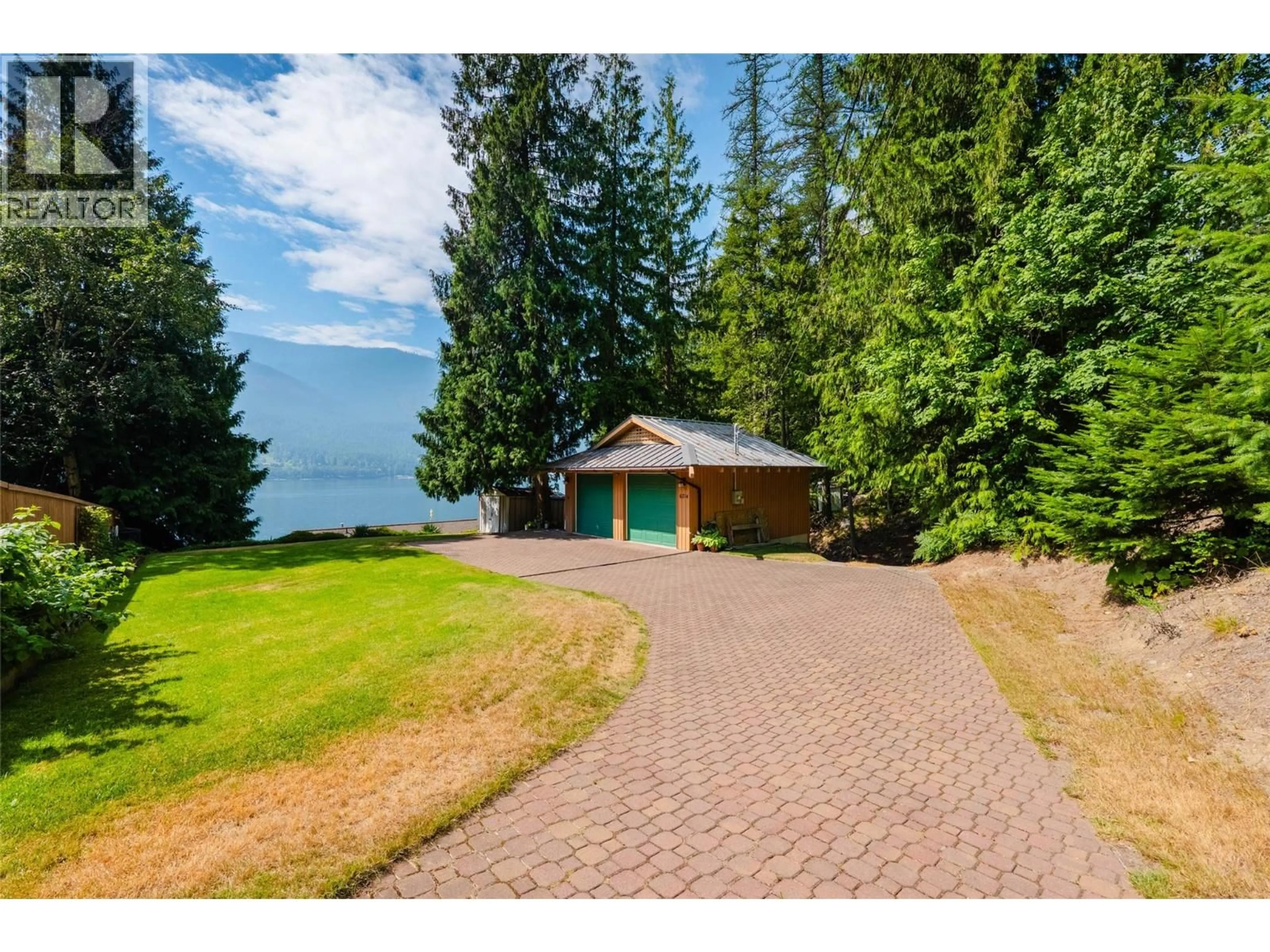 A pic from outside/outdoor area/front of a property/back of a property/a pic from drone, water/lake/river/ocean view for 6714 3A HIGHWAY, Nelson British Columbia V1L6S2