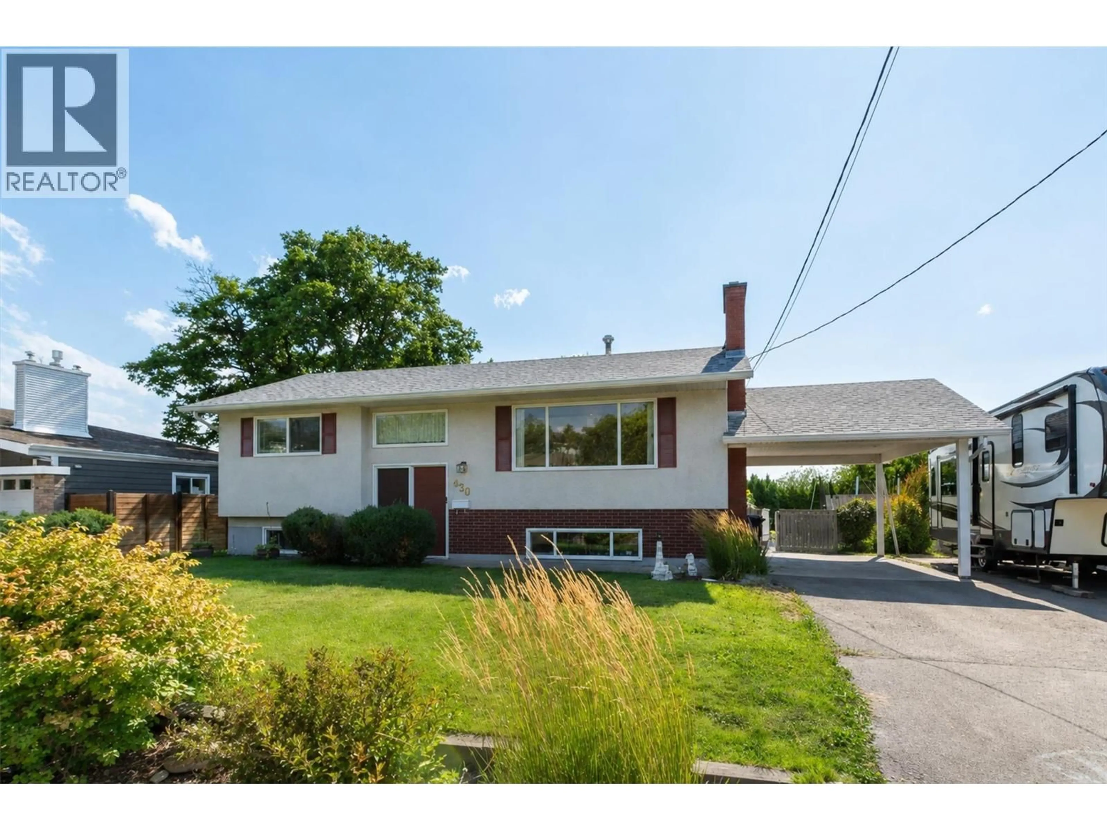 Home with vinyl exterior material, street for 430 PERTH ROAD, Kelowna British Columbia V1X3R4
