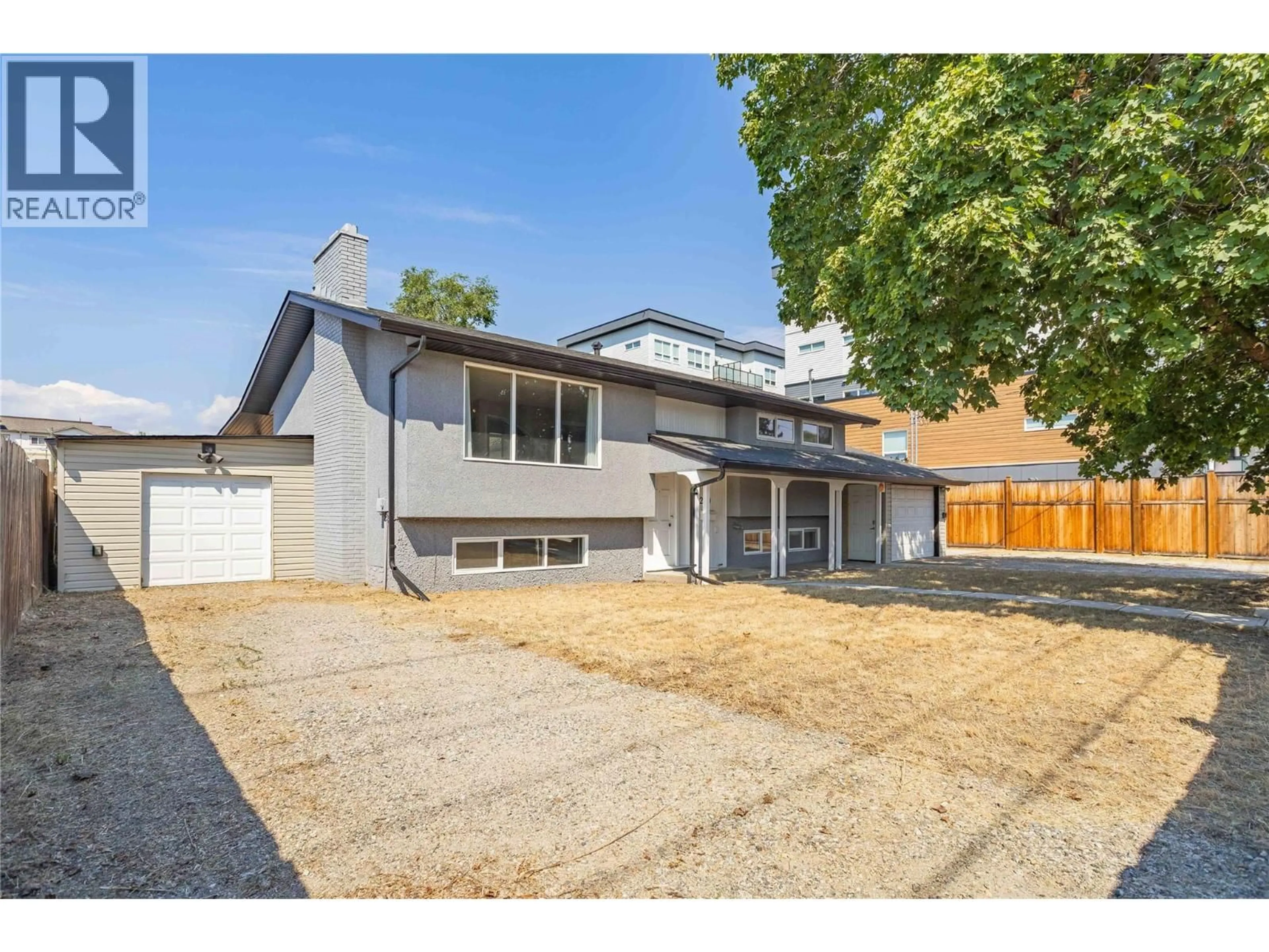 A pic from outside/outdoor area/front of a property/back of a property/a pic from drone, street for 240 PETCH ROAD, Kelowna British Columbia V1X3S4