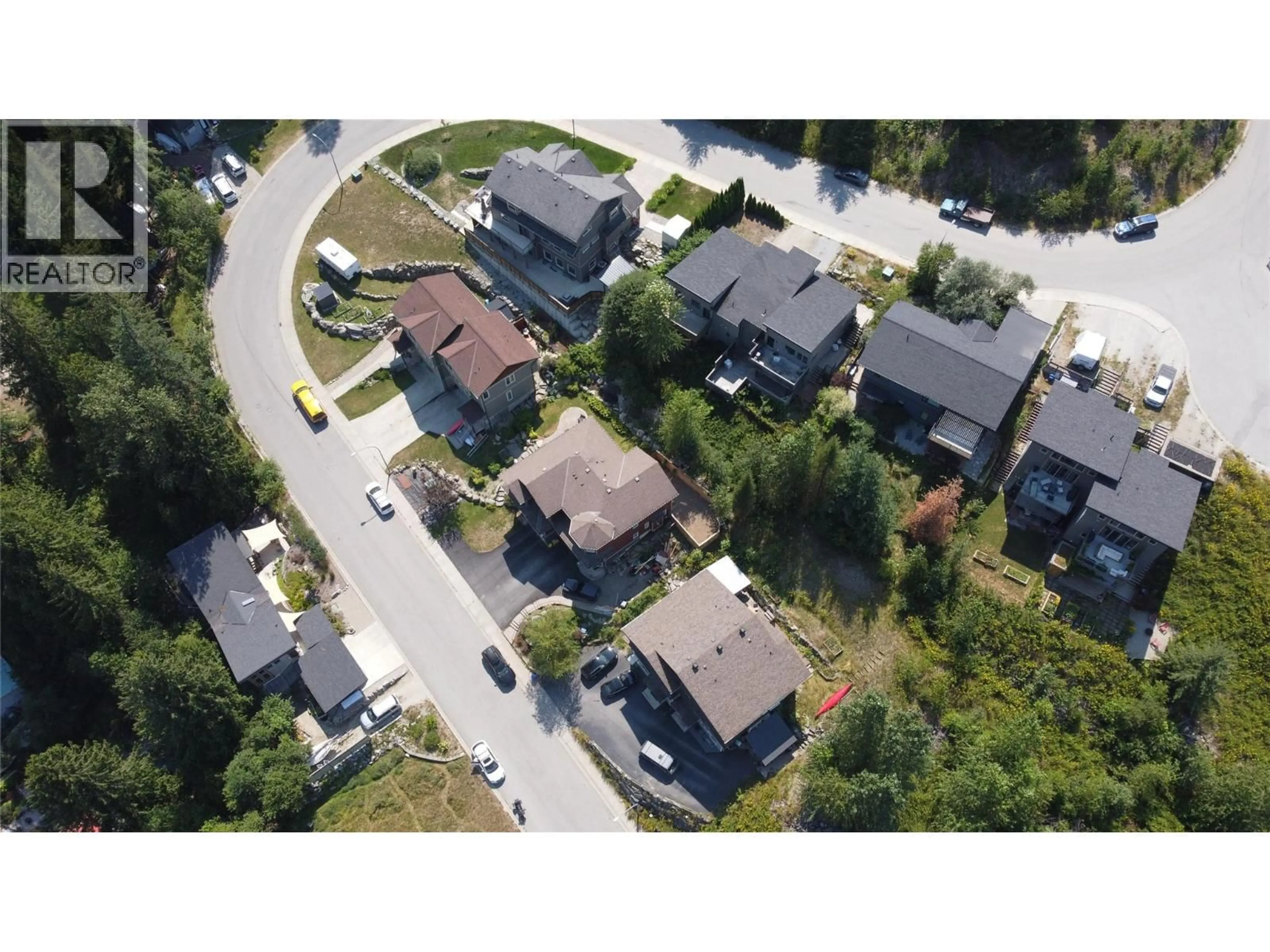 A pic from outside/outdoor area/front of a property/back of a property/a pic from drone, street for A - 2410 PERRIER LANE, Nelson British Columbia V1L7C3