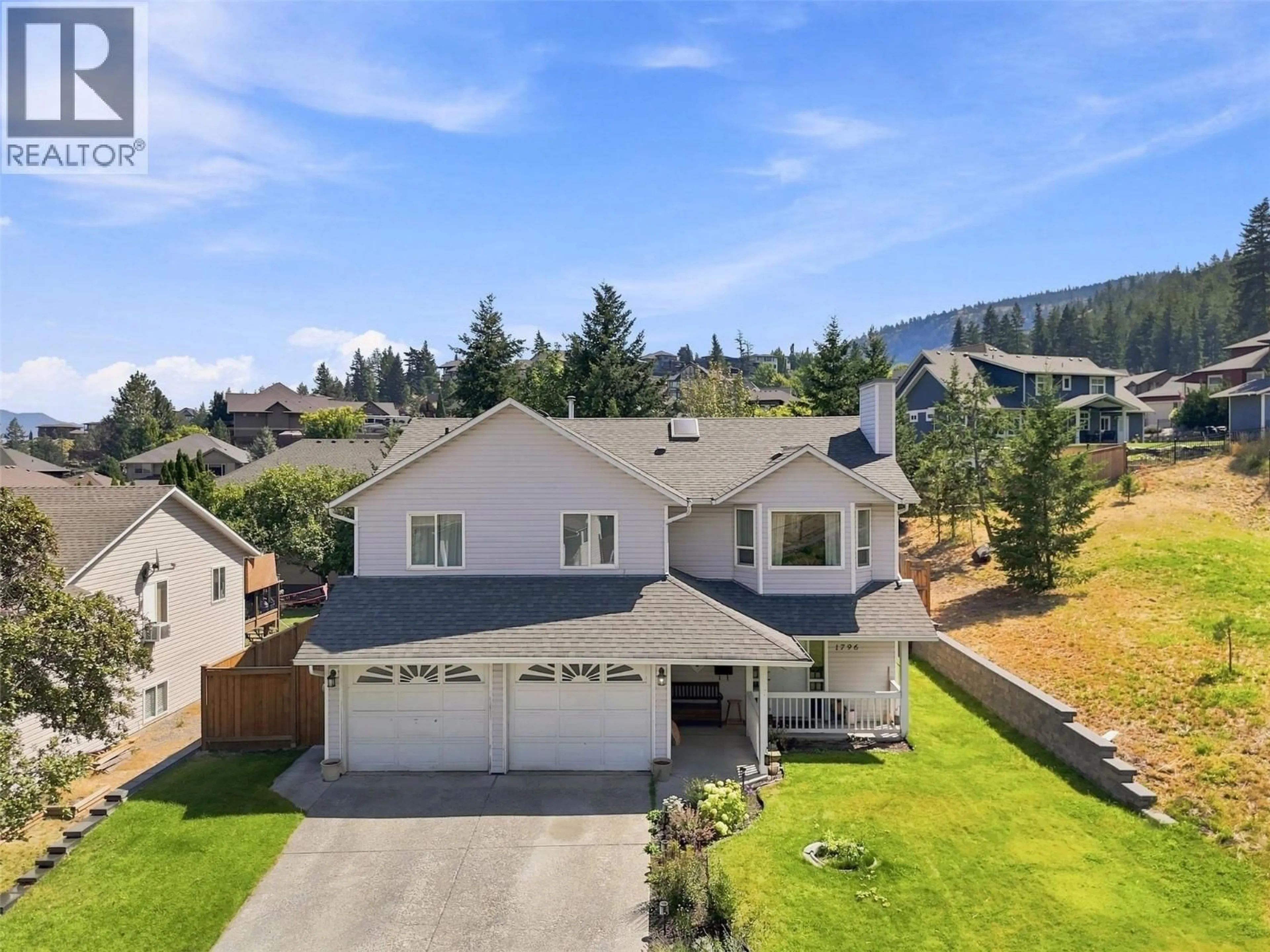 A pic from outside/outdoor area/front of a property/back of a property/a pic from drone, mountain view for 1796 BABINE AVENUE, Kamloops British Columbia V2E2P7