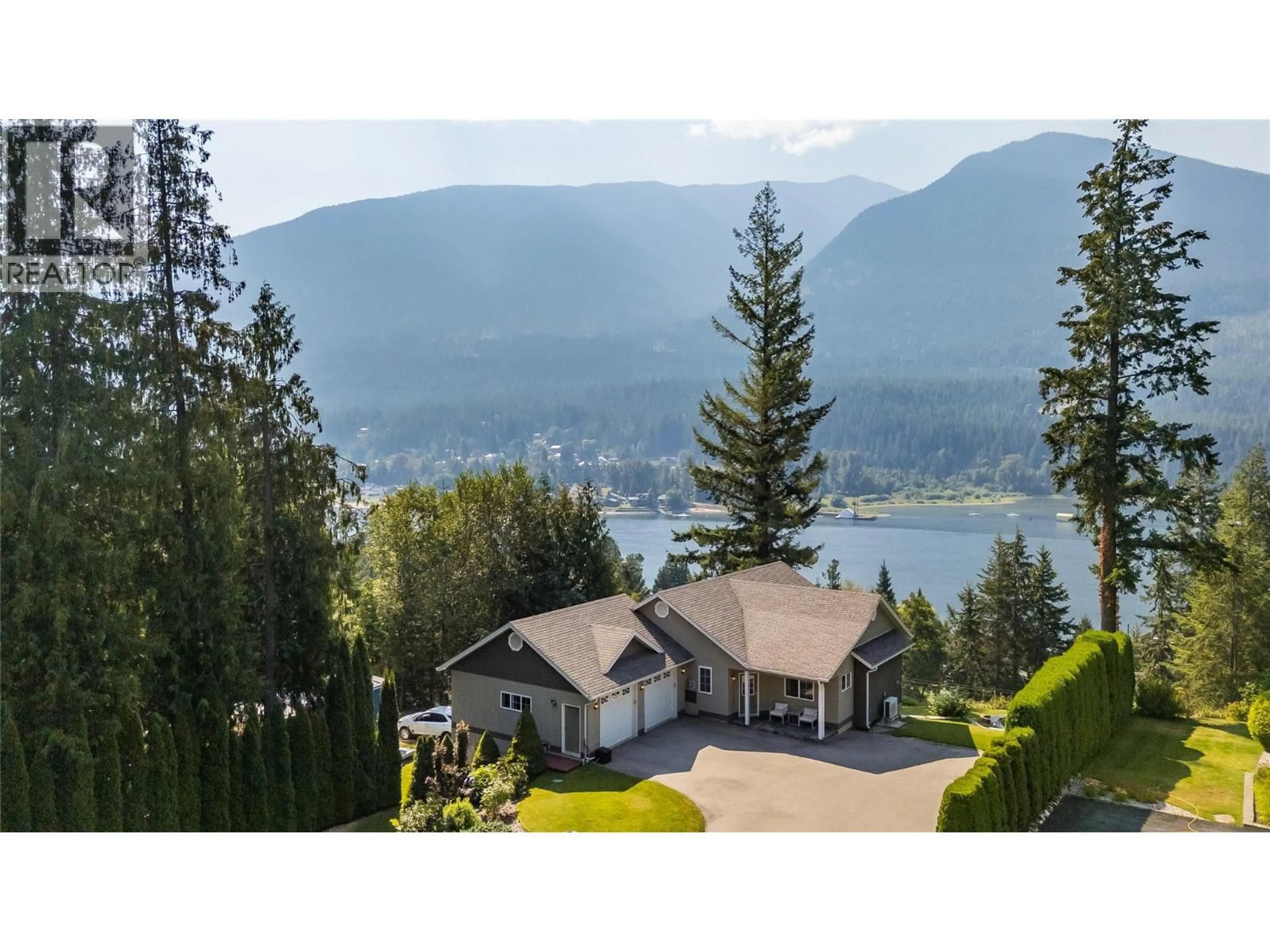 A pic from outside/outdoor area/front of a property/back of a property/a pic from drone, water/lake/river/ocean view for 408 BALFOUR HEIGHTS ROAD, Balfour British Columbia V0G1C0